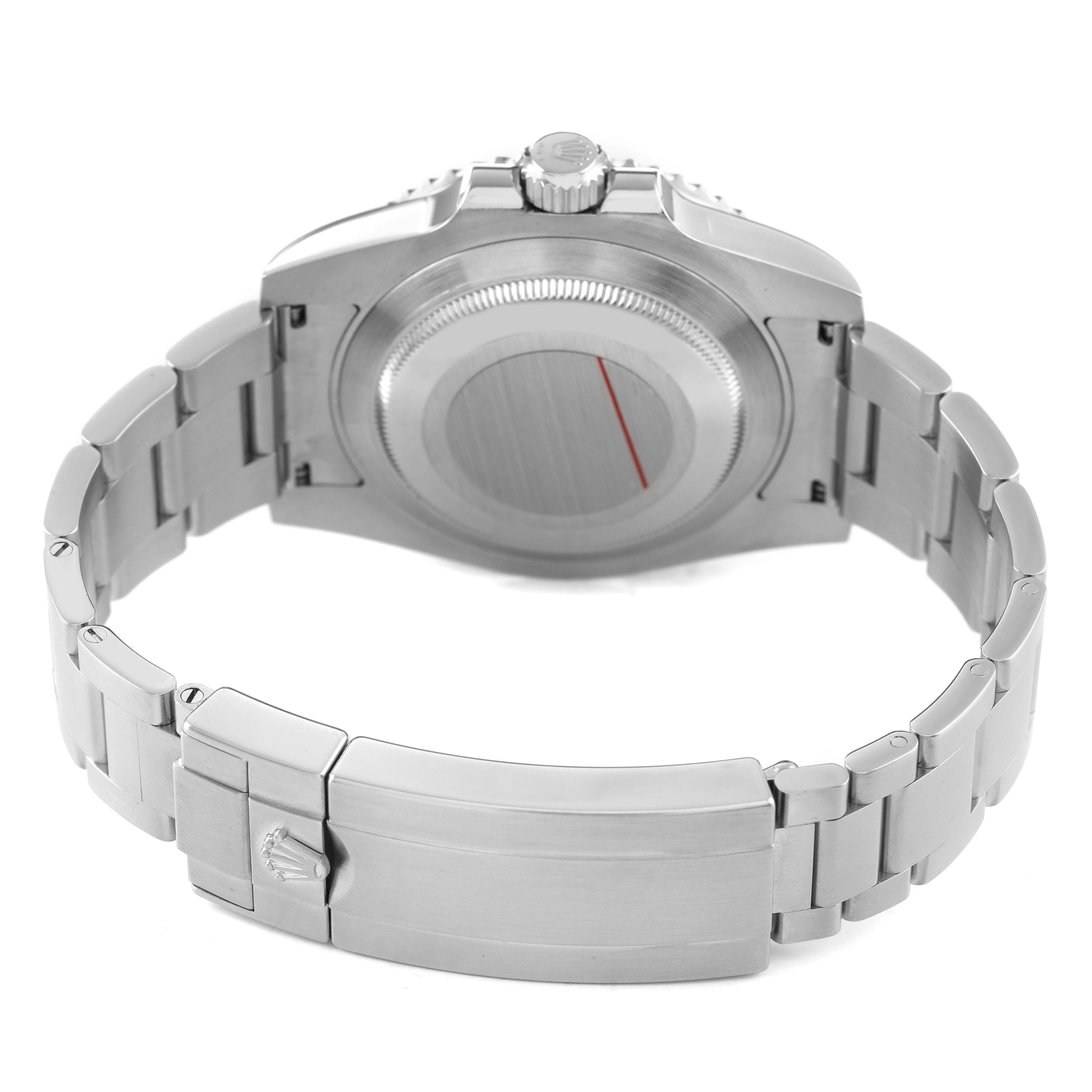 The image shows a Rolex Submariner 116610LV Men's Stainless Steel Green Dial viewed from the back, highlighting the case back and bracelet with the clasp.