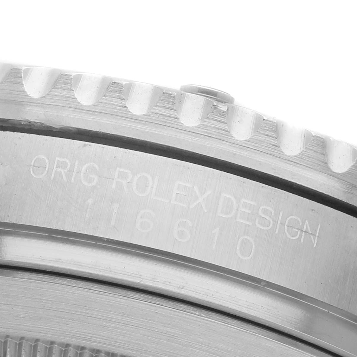 The image shows a close-up of the side of a Rolex Submariner 116610LV Men's Stainless Steel Green Dial, highlighting the engraved design and model number.