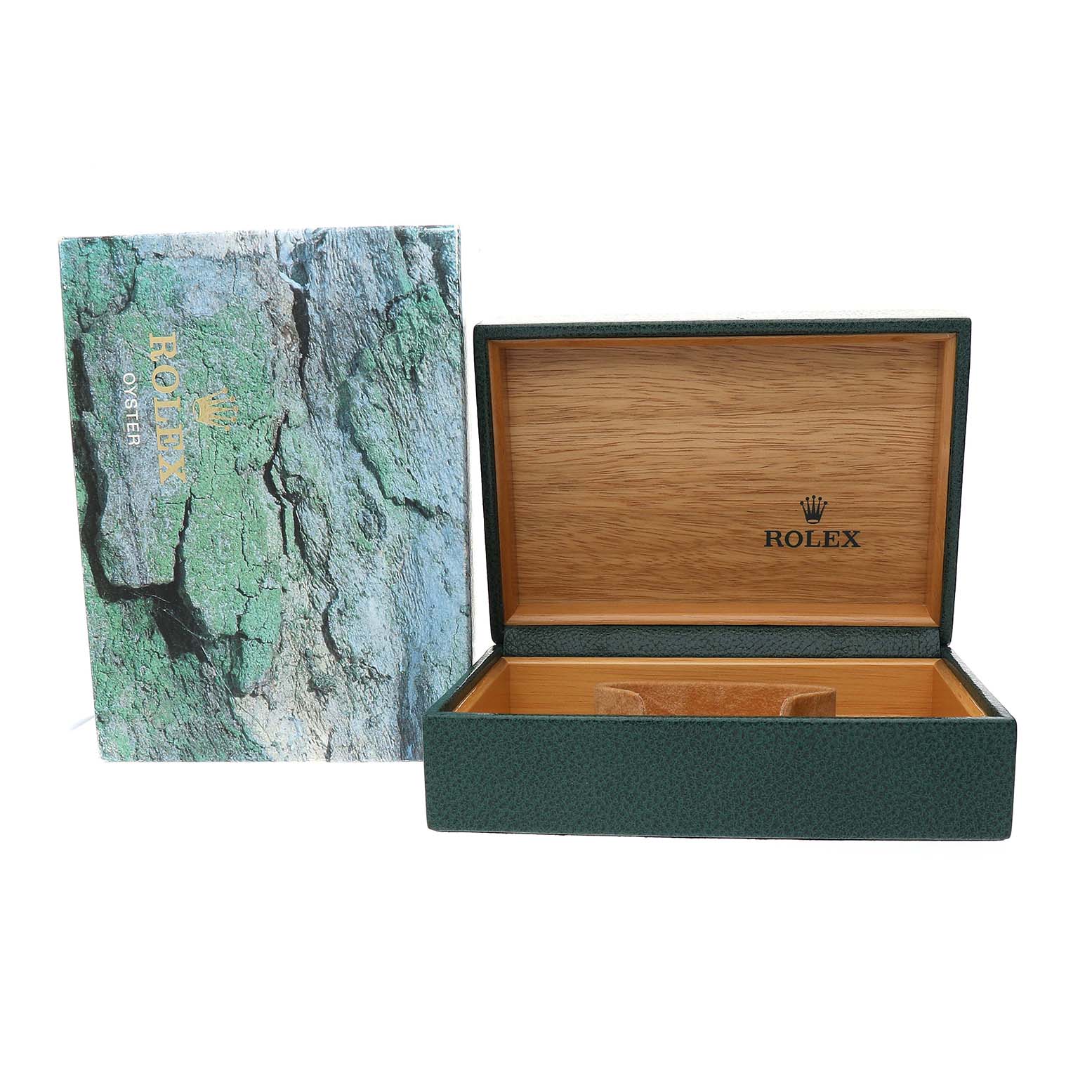 The image shows an open Rolex watch box for a Submariner model, with a textured exterior and a wooden interior.