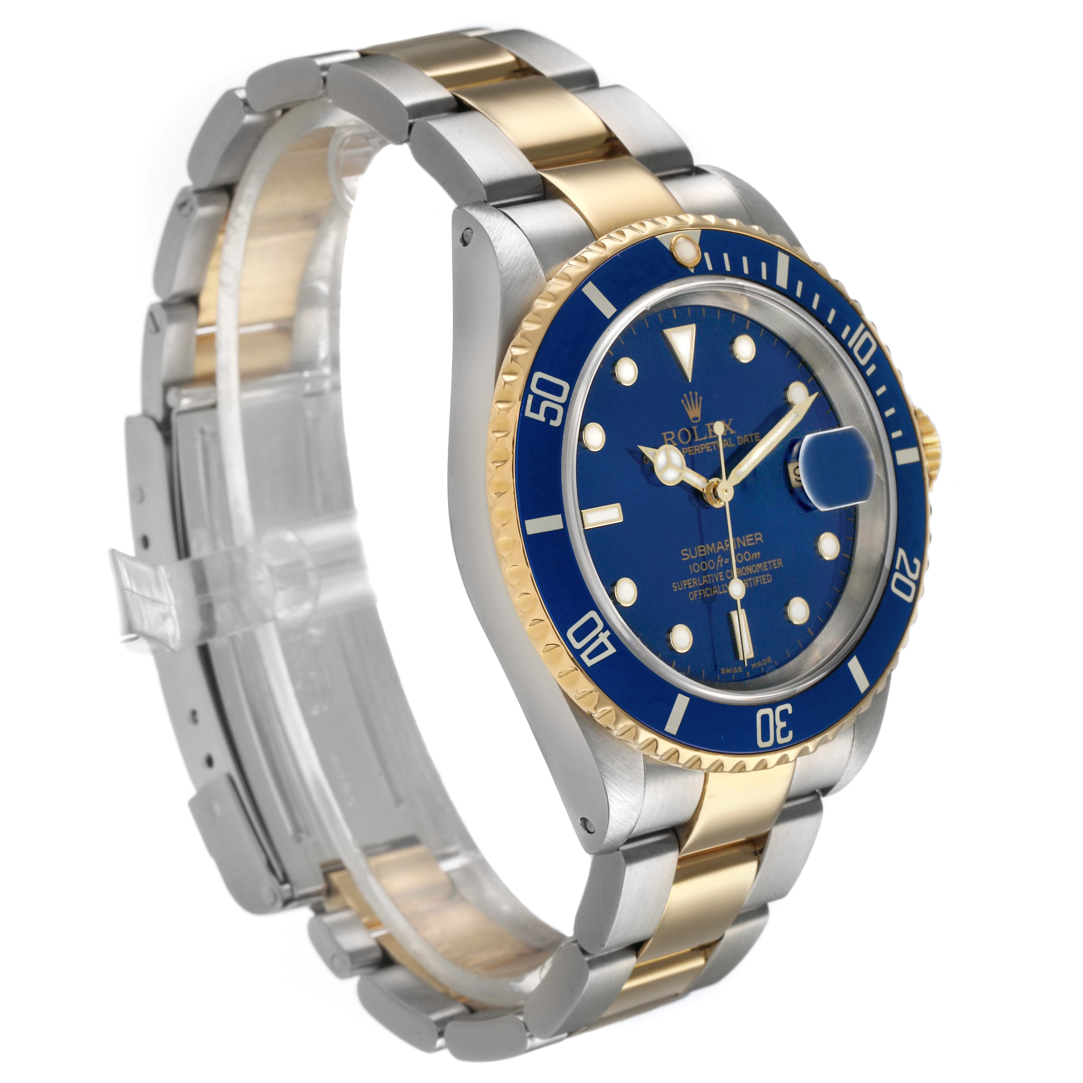 The Rolex Submariner 16613 Men's Steel and Gold (two tone) Blue Dial watch is shown at an angled side view, revealing the dial, bezel, bracelet, and clasp.