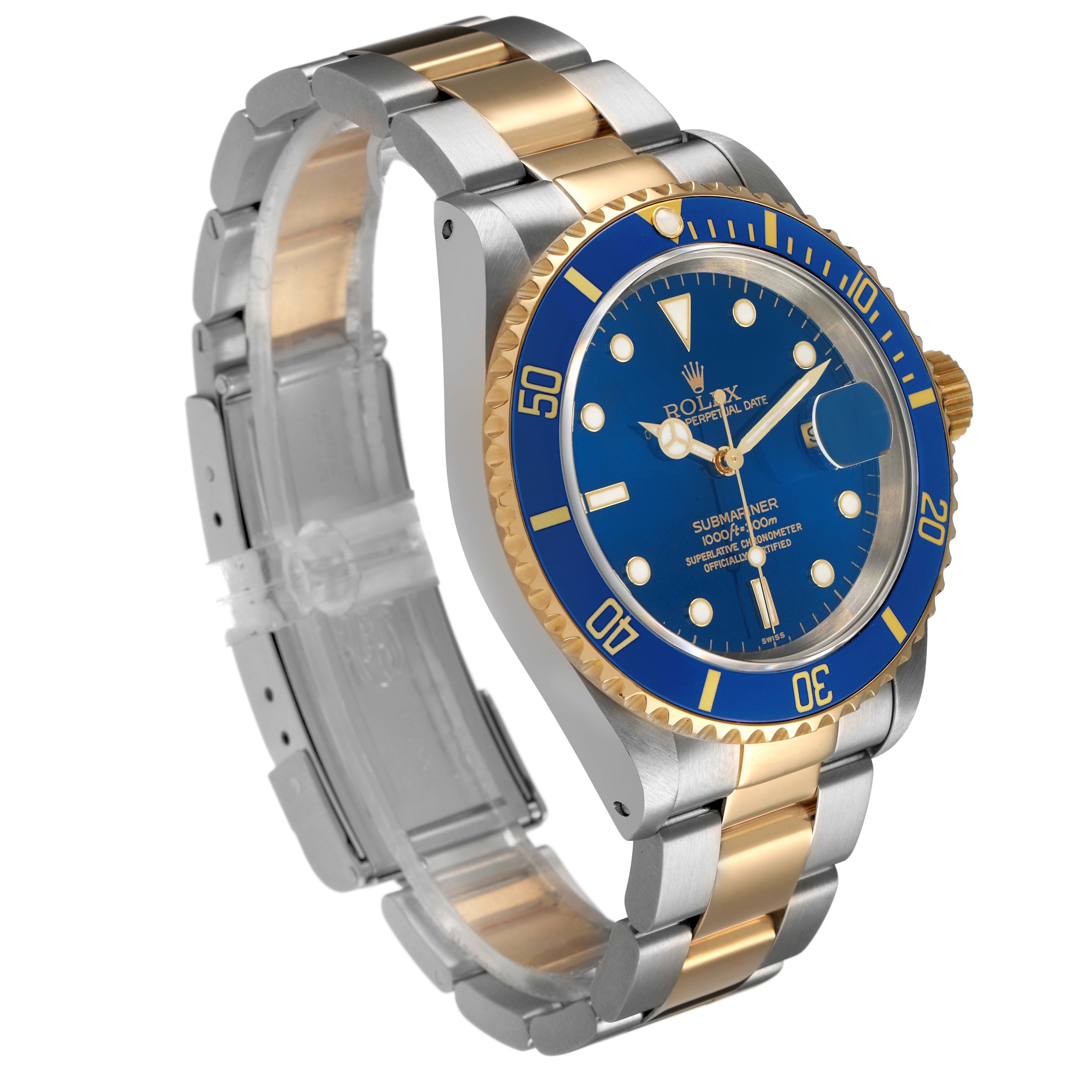 The Rolex Submariner 16613 Men's Steel and Gold (two tone) Blue Dial watch is shown at a slight angled view, featuring its blue dial, bezel, and two-tone bracelet.