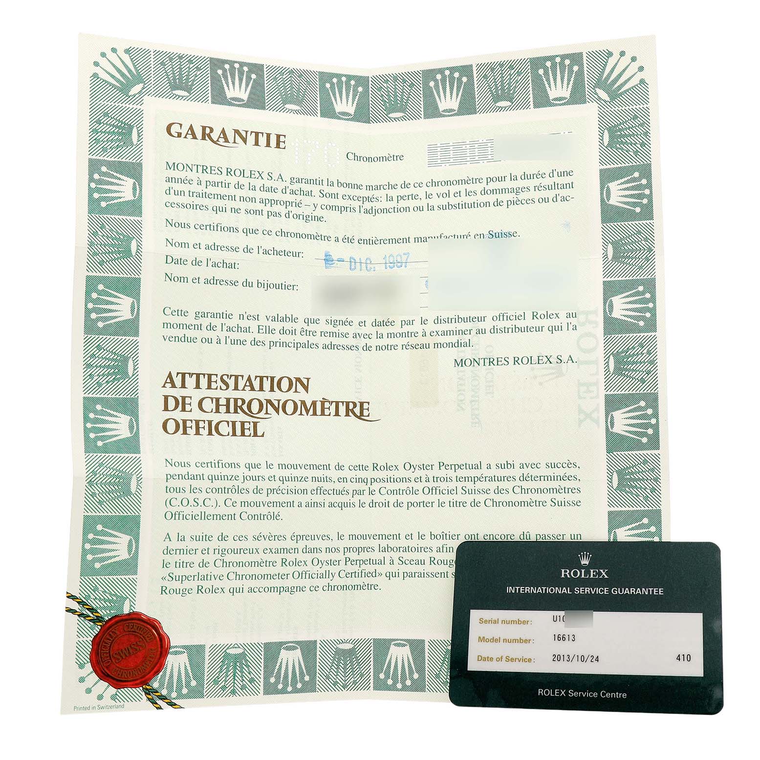 The image shows a Rolex Submariner 16613 Men's Steel and Gold (two tone) Silver Dial warranty paperwork and service card, with both items displayed flat.