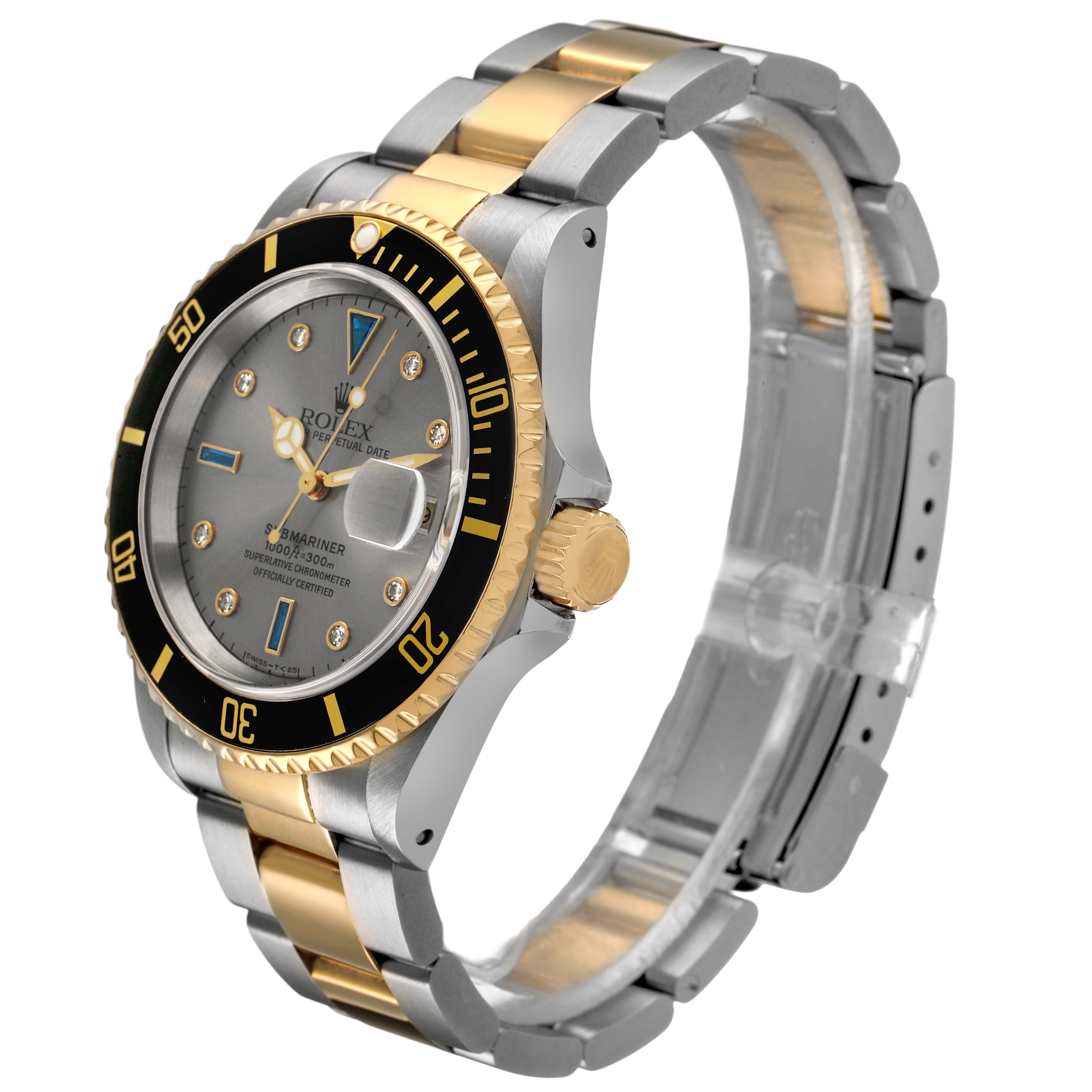 The Rolex Submariner 16613 Men's Steel and Gold (two tone) Silver Dial watch is shown at a side angle, featuring the bezel, dial, bracelet, and crown.