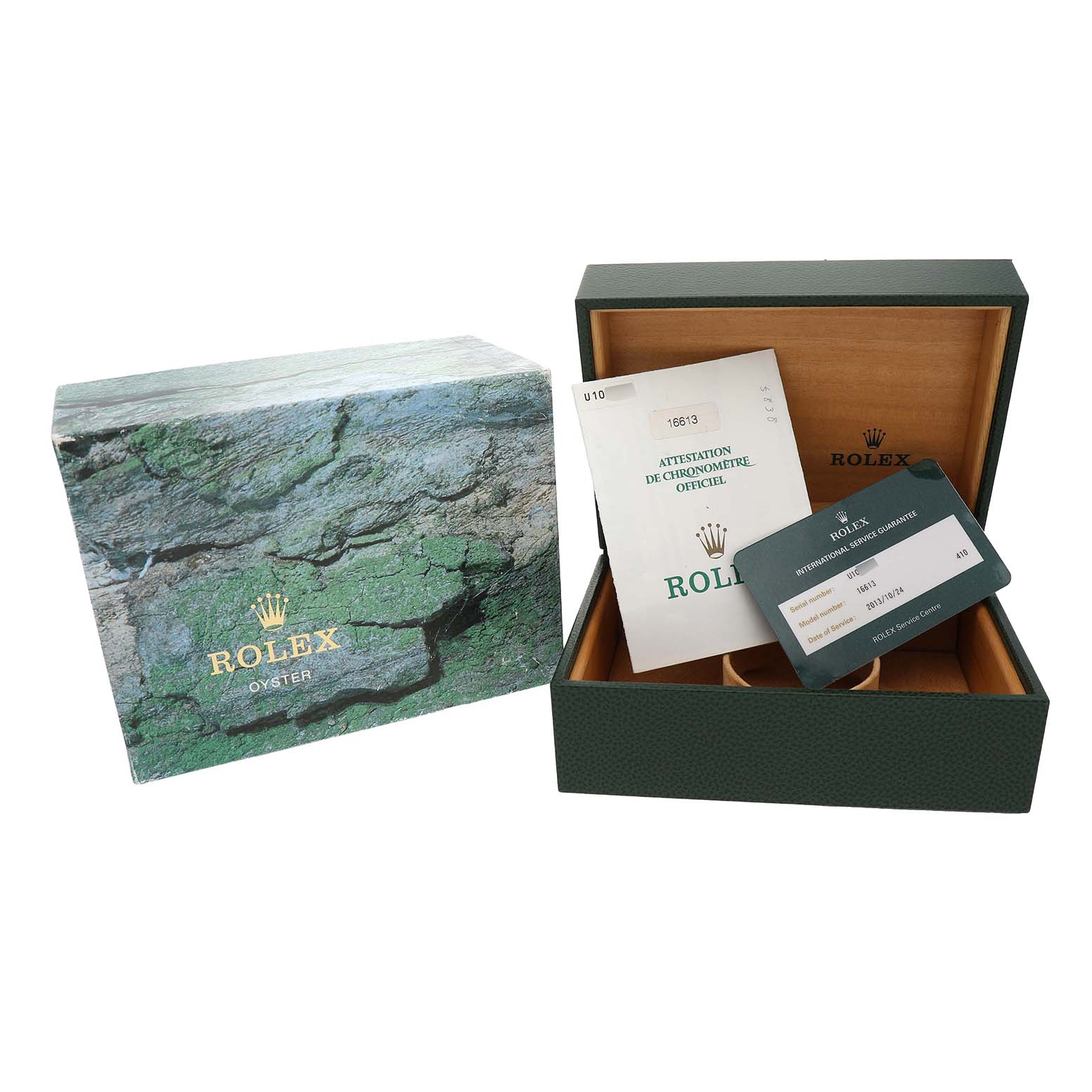 The image shows a Rolex Submariner 16613 Men's Steel and Gold (two tone) Silver Dial box, warranty card, and certificate with a top-down angle.