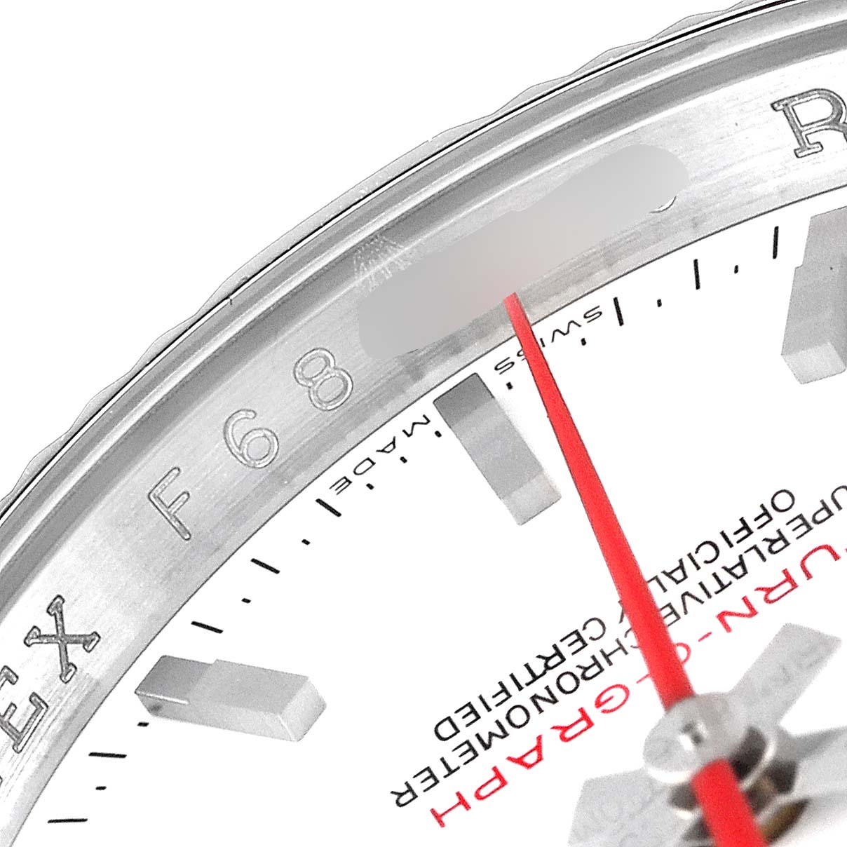 Close-up shot of the Rolex Turn-o-Graph 116264 Men
s Stainless Steel White Dial 116264 Men
s Stainless Steel White Dial showing the bezel, dial, red second hand, and part of an hour marker.