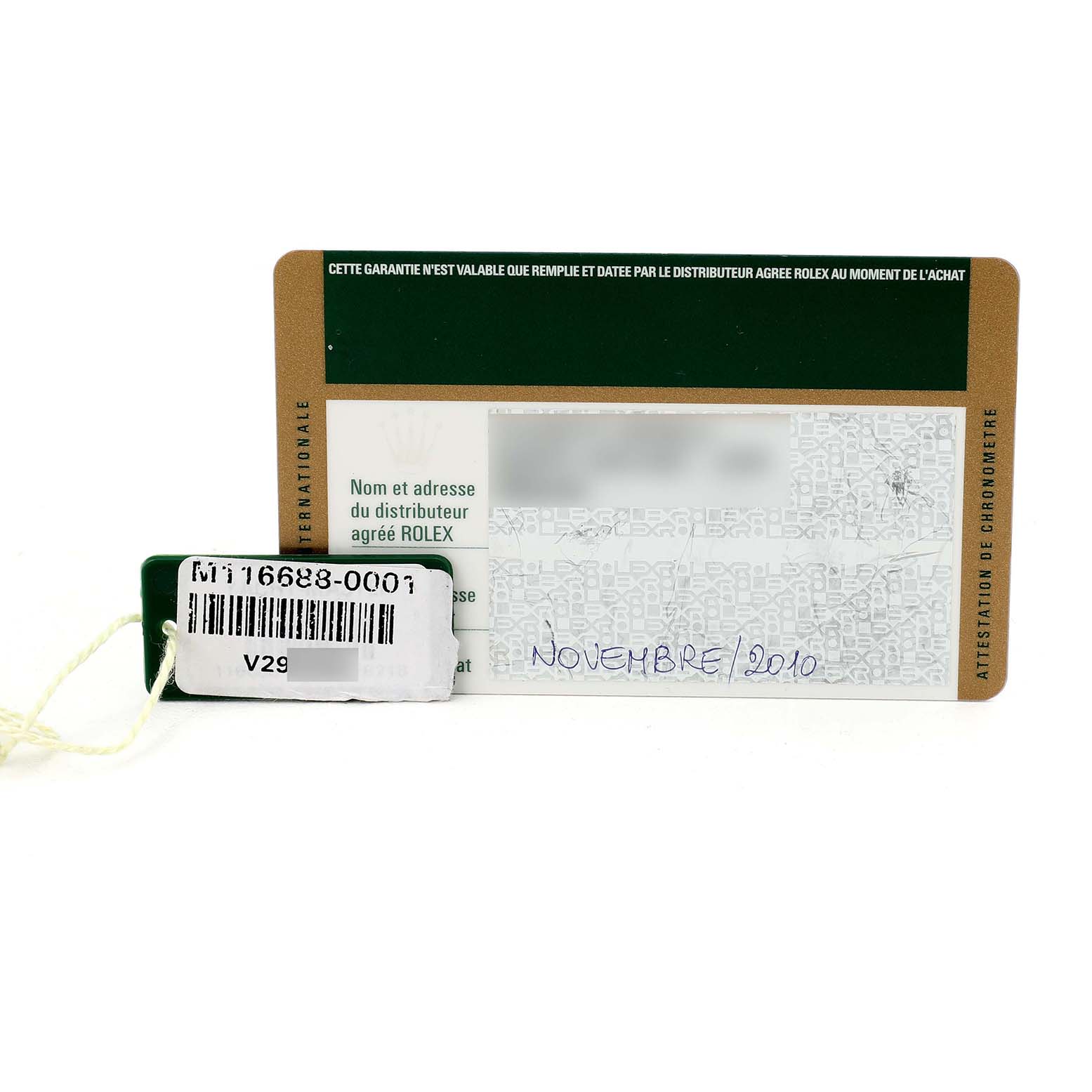 The image shows a guarantee card and a tag for the Rolex Yacht-Master 116688 Men's Yellow Gold White Dial model.