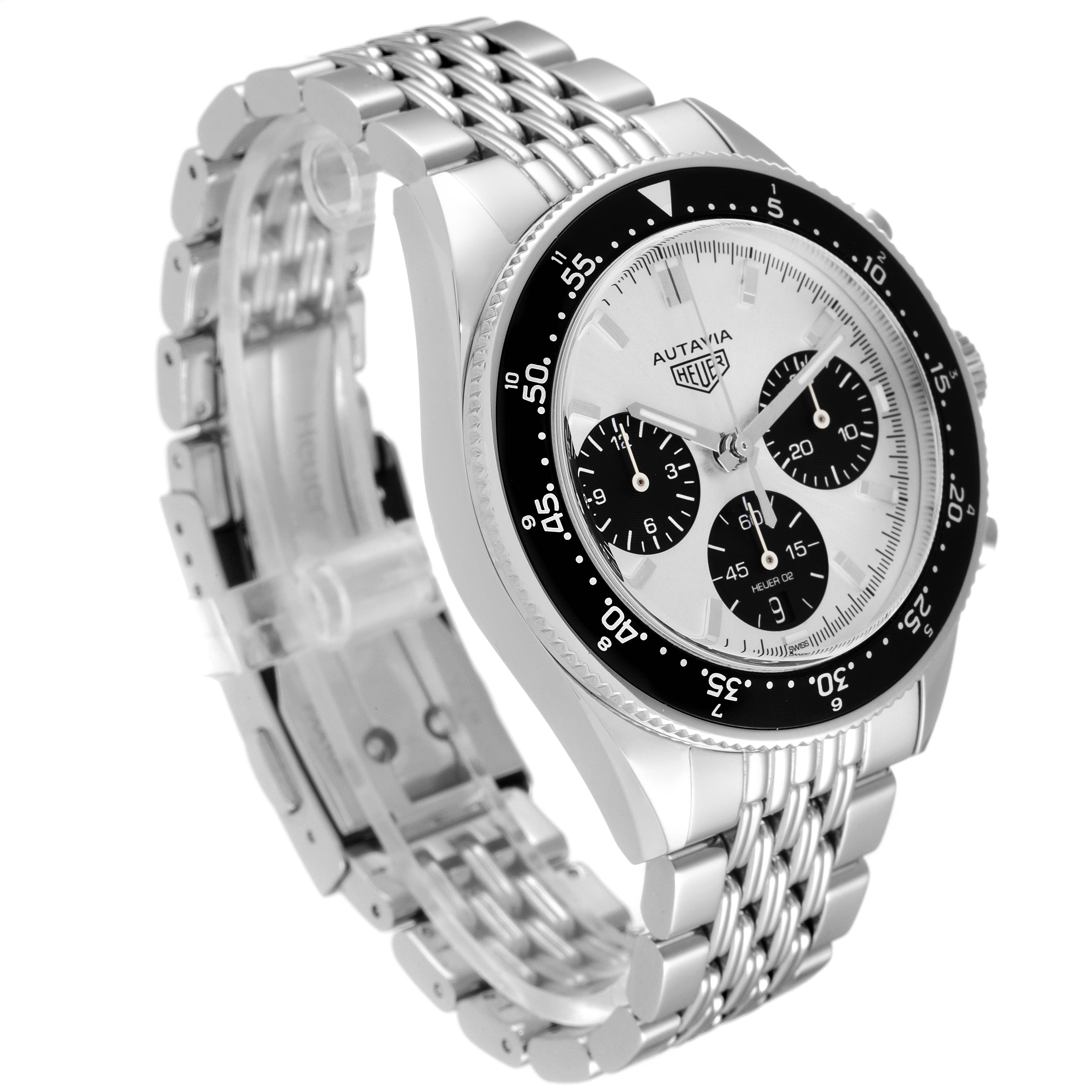 The image shows a side angle of the Tag Heuer Autavia watch, highlighting its bezel, dial, and stainless steel bracelet.