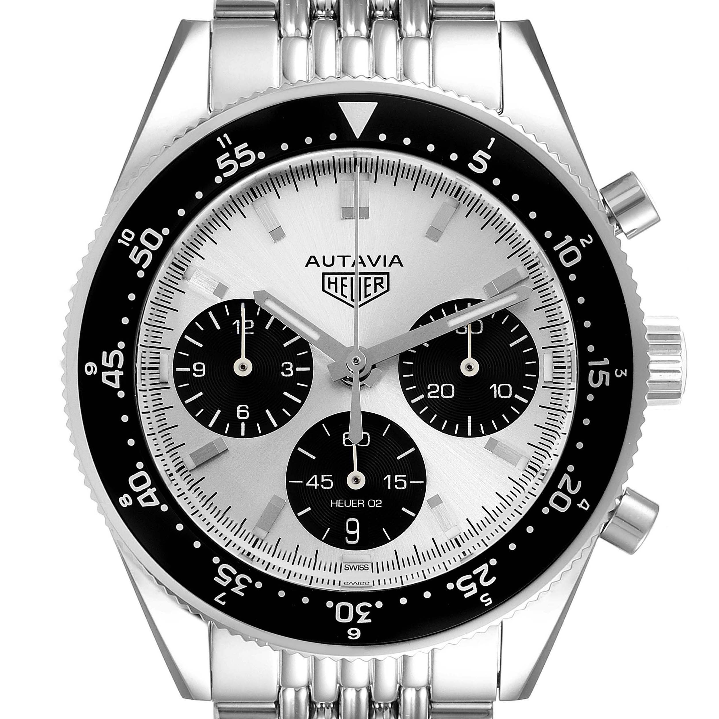 The image shows a front view of the Tag Heuer Autavia watch, displaying its face, bezel, three sub-dials, and part of the bracelet.