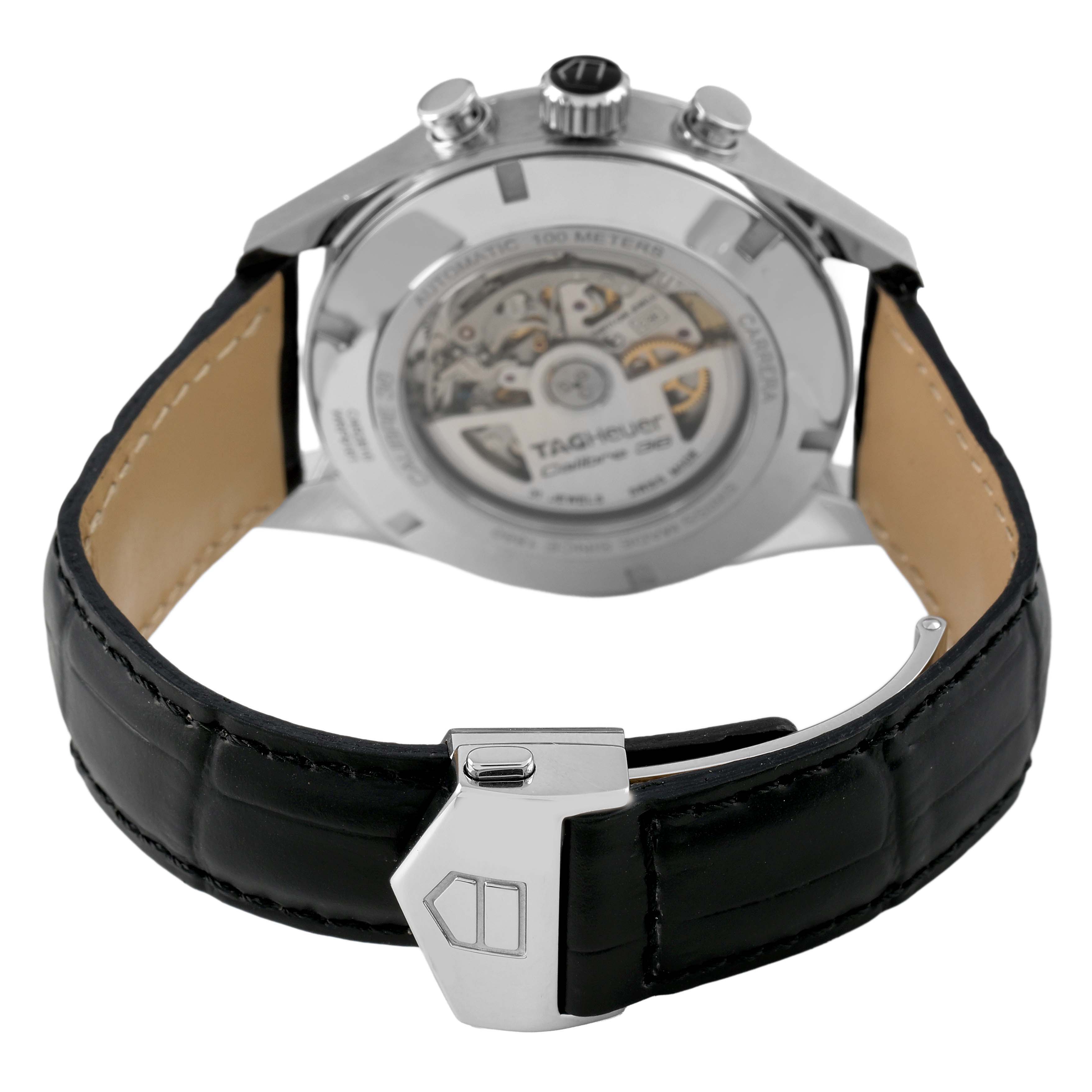 The image shows the back of the Tag Heuer Carrera CAR2B10 Men's Stainless Steel Black Dial watch, focusing on the case back and part of the strap with the clasp.