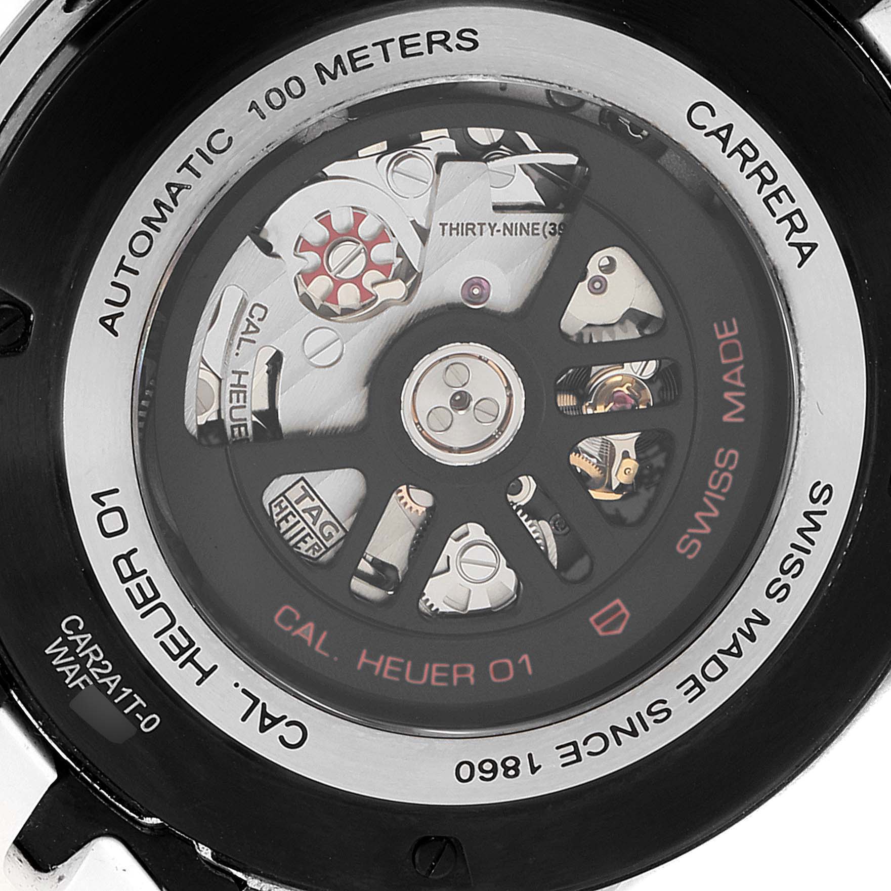 This image shows the back of a Tag Heuer Carrera CAR2A1T-0 Men
s Stainless Steel Black Dial CAR2A1T-0 Men
s Stainless Steel Black Dial watch, highlighting its automatic movement and intricate inner mechanisms.