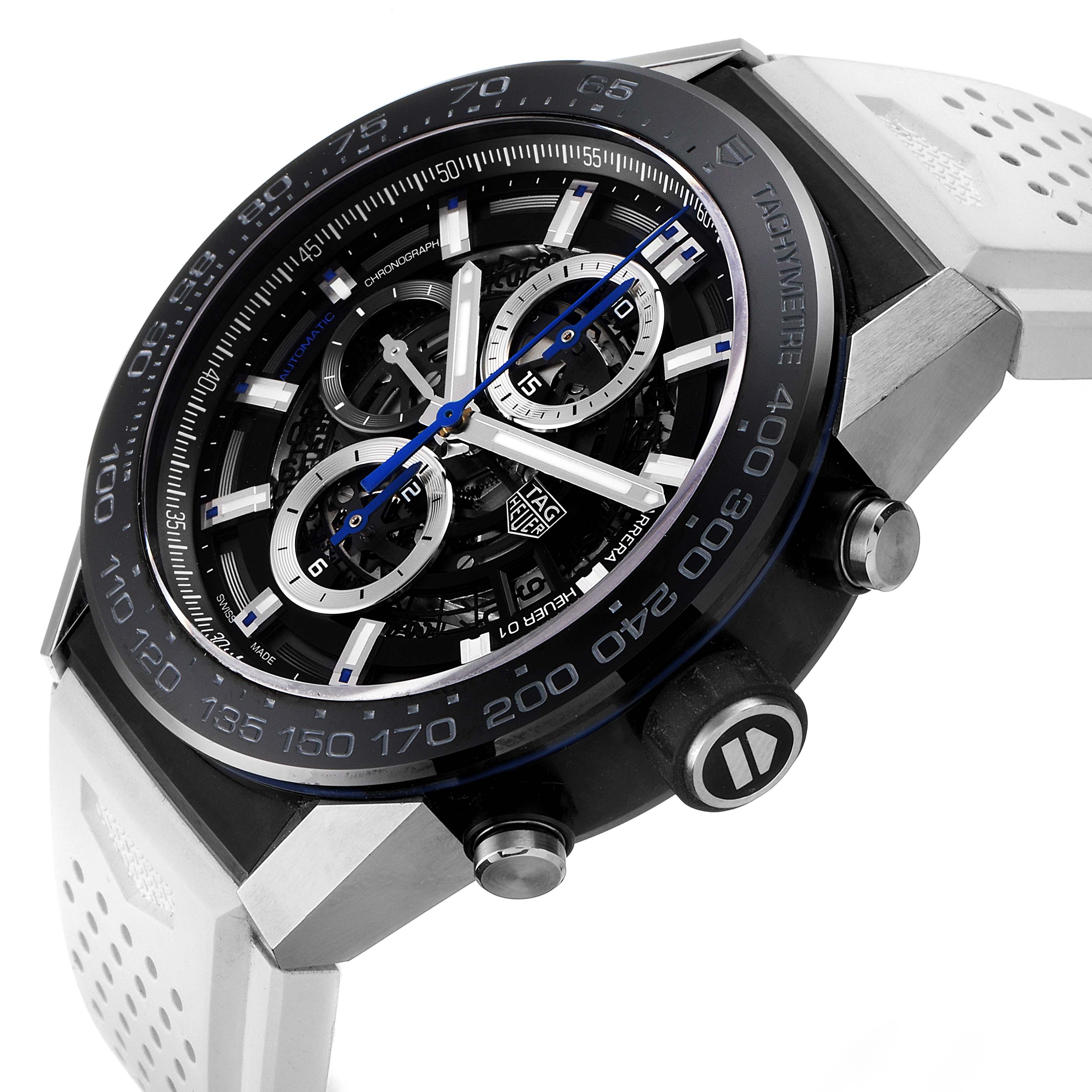 The image shows a close-up of a Tag Heuer Carrera CAR2A1T-0 Men
s Stainless Steel Black Dial CAR2A1T-0 Men
s Stainless Steel Black Dial watch, highlighting its face, bezel, dial, and white strap at an angle.