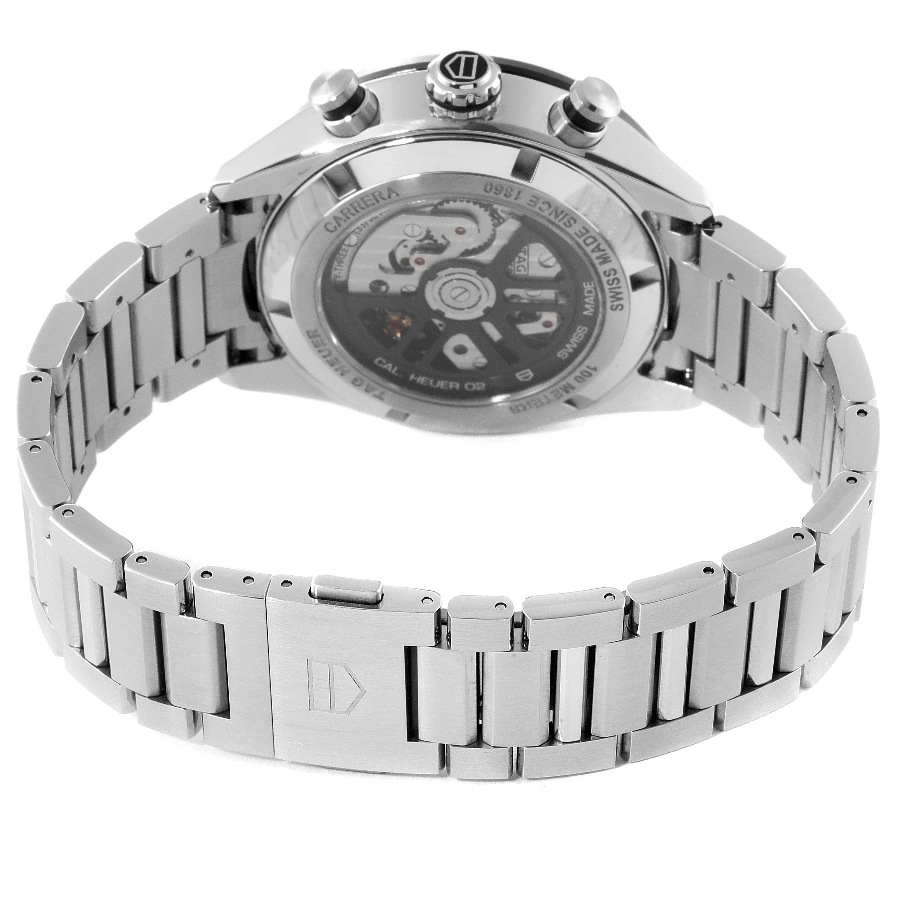 The image shows the back view of a Tag Heuer Carrera CBN2A1B.BA0643 Men's Stainless Steel Black Dial CBN2A1B.BA0643 Men's Stainless Steel Black Dial watch highlighting its stainless steel bracelet and transparent case back.