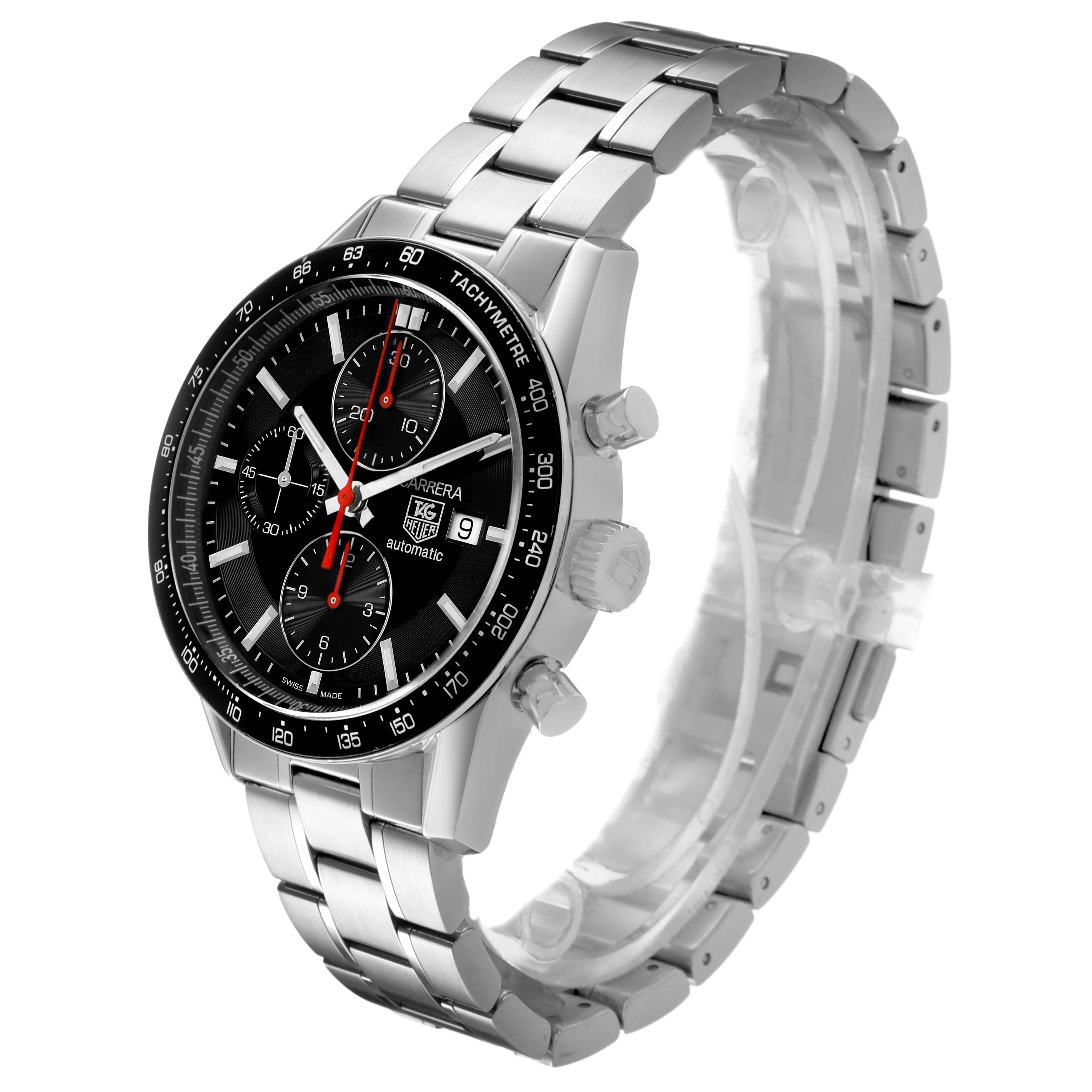 The Tag Heuer Carrera CV2014 Men's Stainless Steel Black Dial watch is shown at a three-quarter angle, highlighting its face, bezel, crown, and bracelet.
