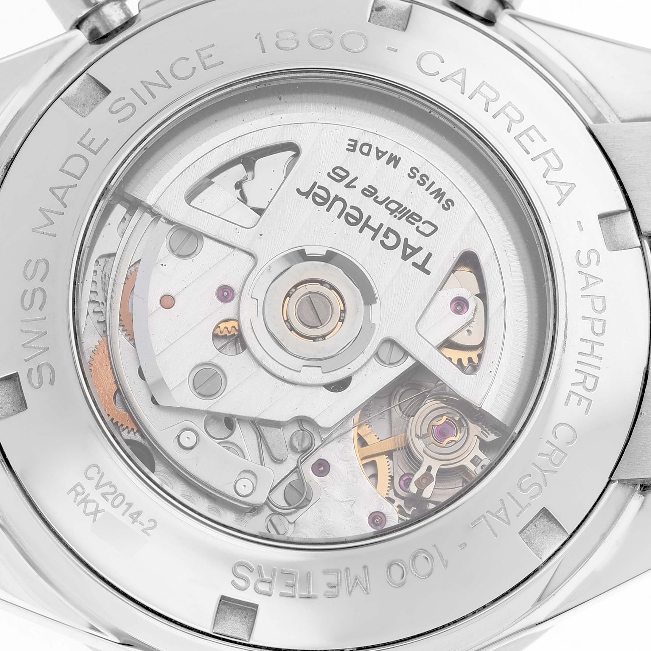 The image shows a Tag Heuer Carrera CV2014 Men's Stainless Steel Black Dial watch's back, highlighting its Calibre 16 movement through a transparent case back.