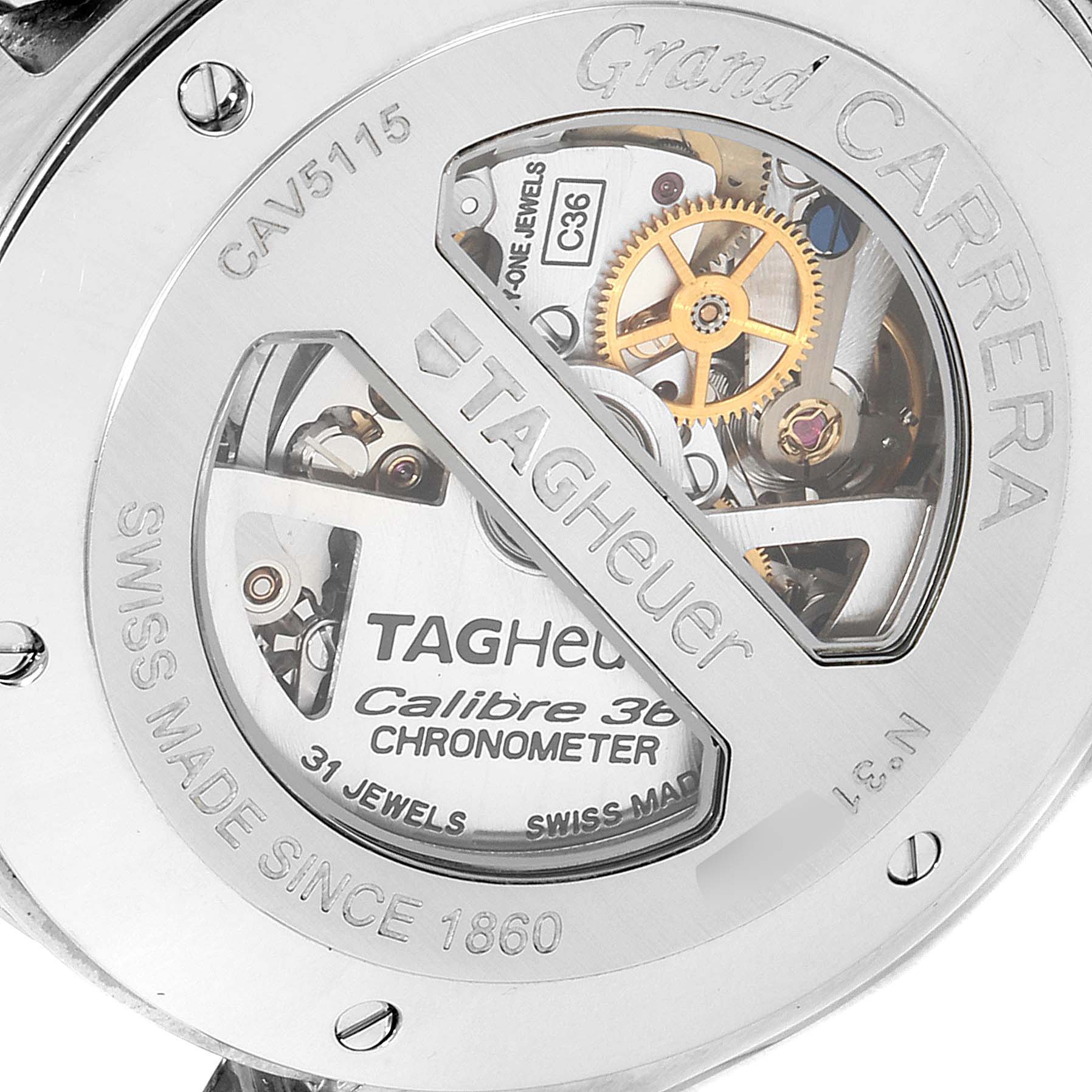 The image shows a close-up of the back case of a Tag Heuer Carrera CAV5115.BA0902 Men
s Stainless Steel Black Dial CAV5115.BA0902 Men
s Stainless Steel Black Dial watch, revealing the intricate movement and internal mechanics.