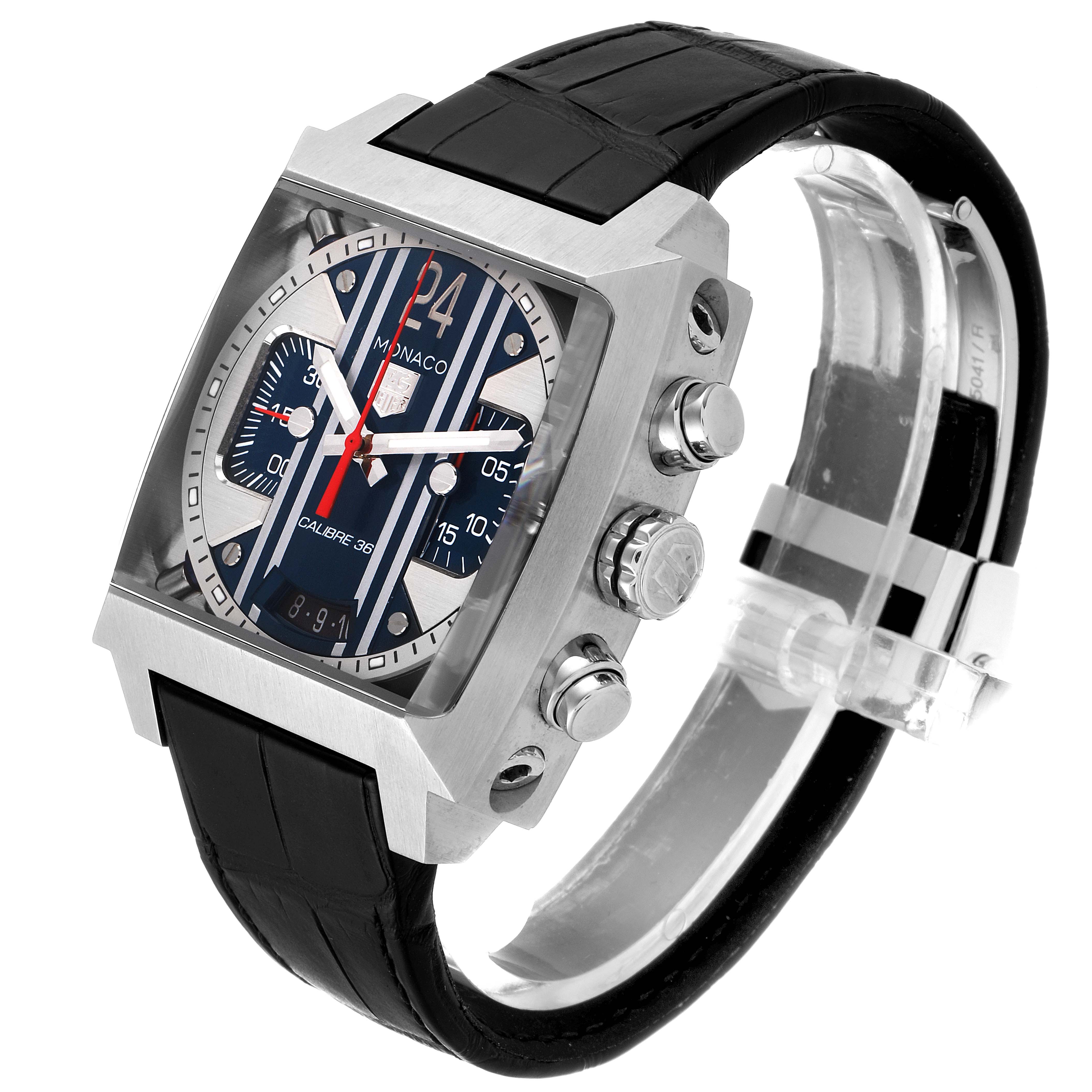 The image shows a Tag Heuer Monaco CAL5111.FC6299 Men
s Stainless Steel Blue Dial CAL5111.FC6299 Men
s Stainless Steel Blue Dial model watch at a three-quarter angle, displaying the face, side buttons, and black leather strap.