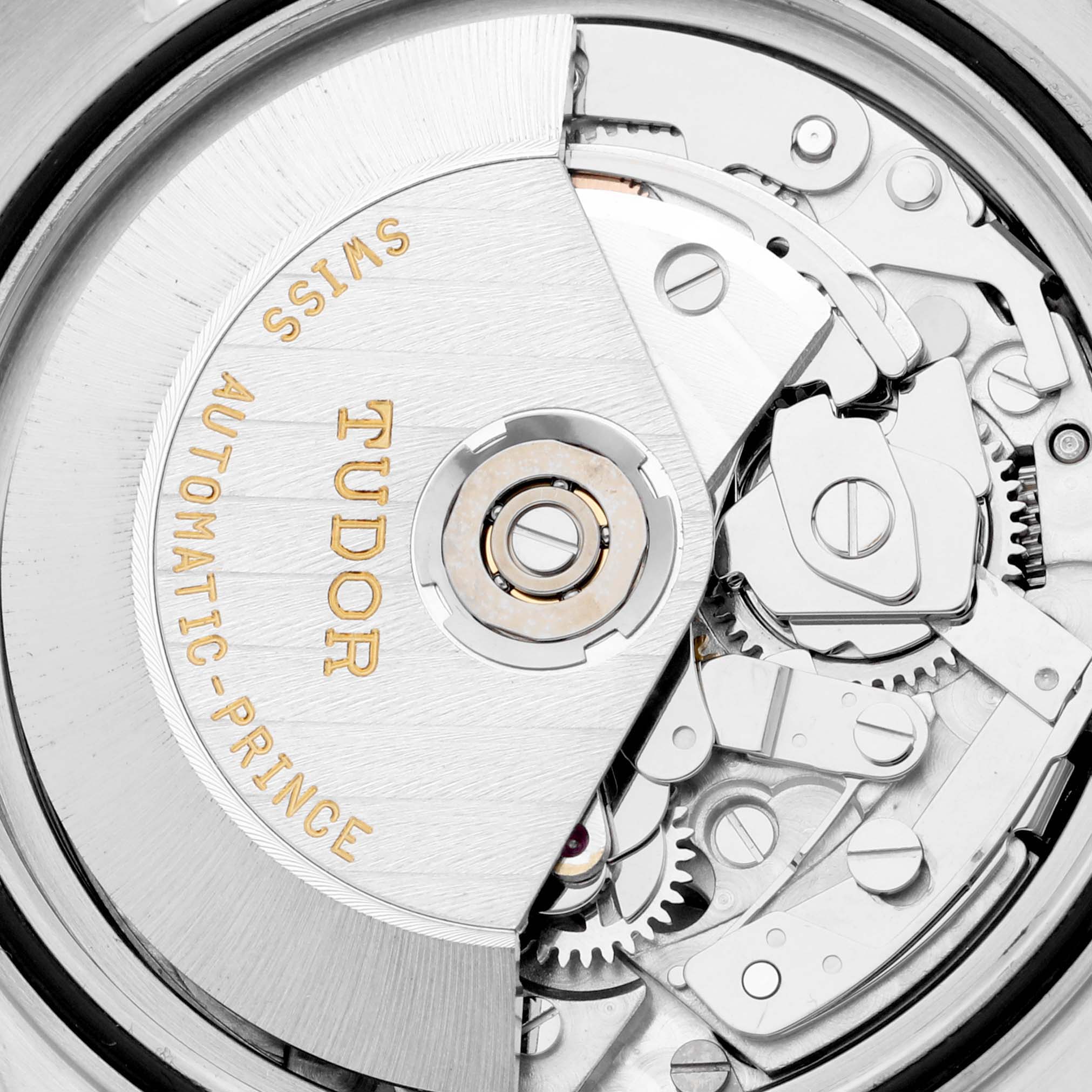 This image shows an angled close-up of the internal mechanisms of a Tudor Prince Automatic watch.