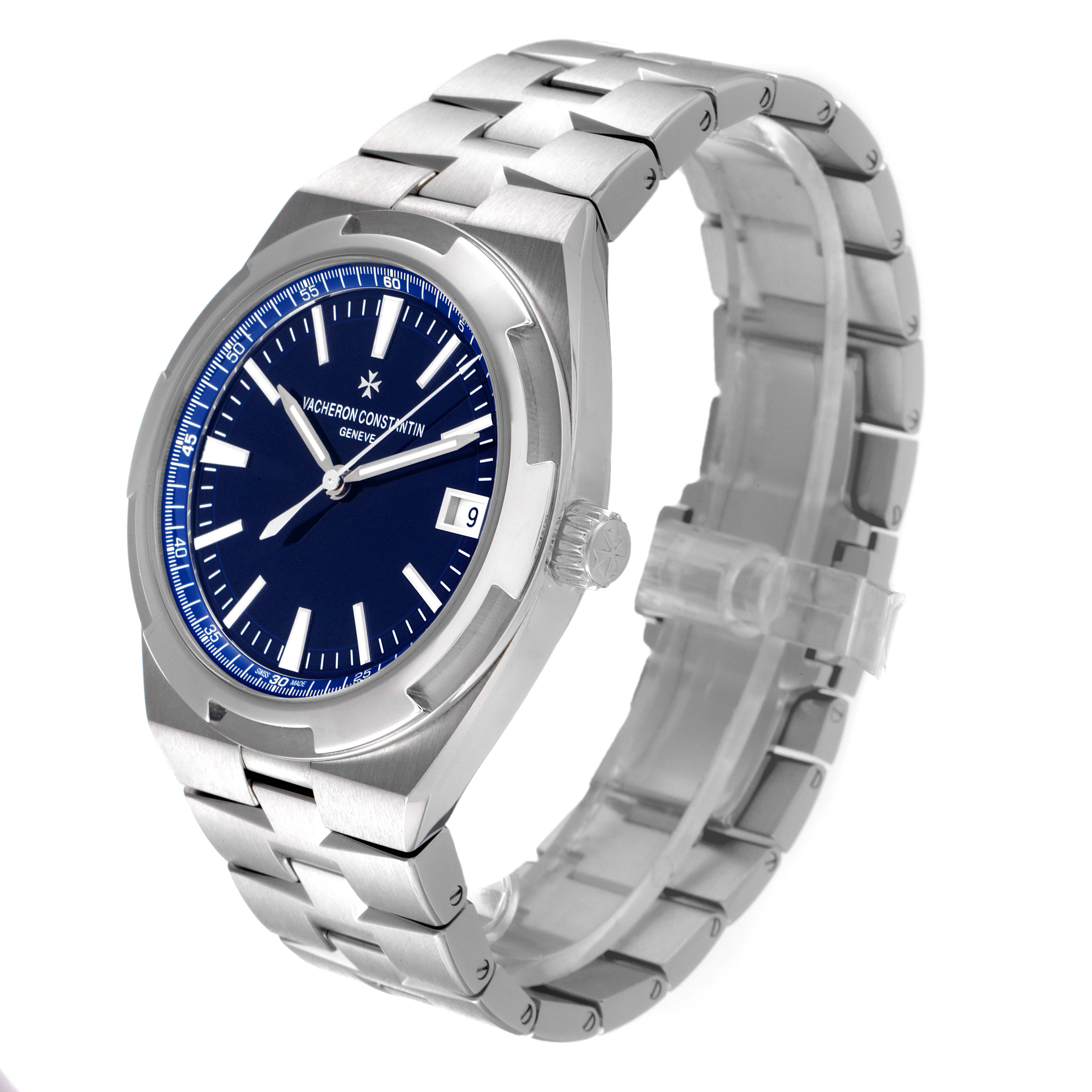 The Vacheron Constantin Overseas 4500V/110A-B128 Men's Stainless Steel Blue Dial 4500V/110A-B128 Men's Stainless Steel Blue Dial watch is shown at an angle highlighting its bracelet, bezel, dial, and date window.