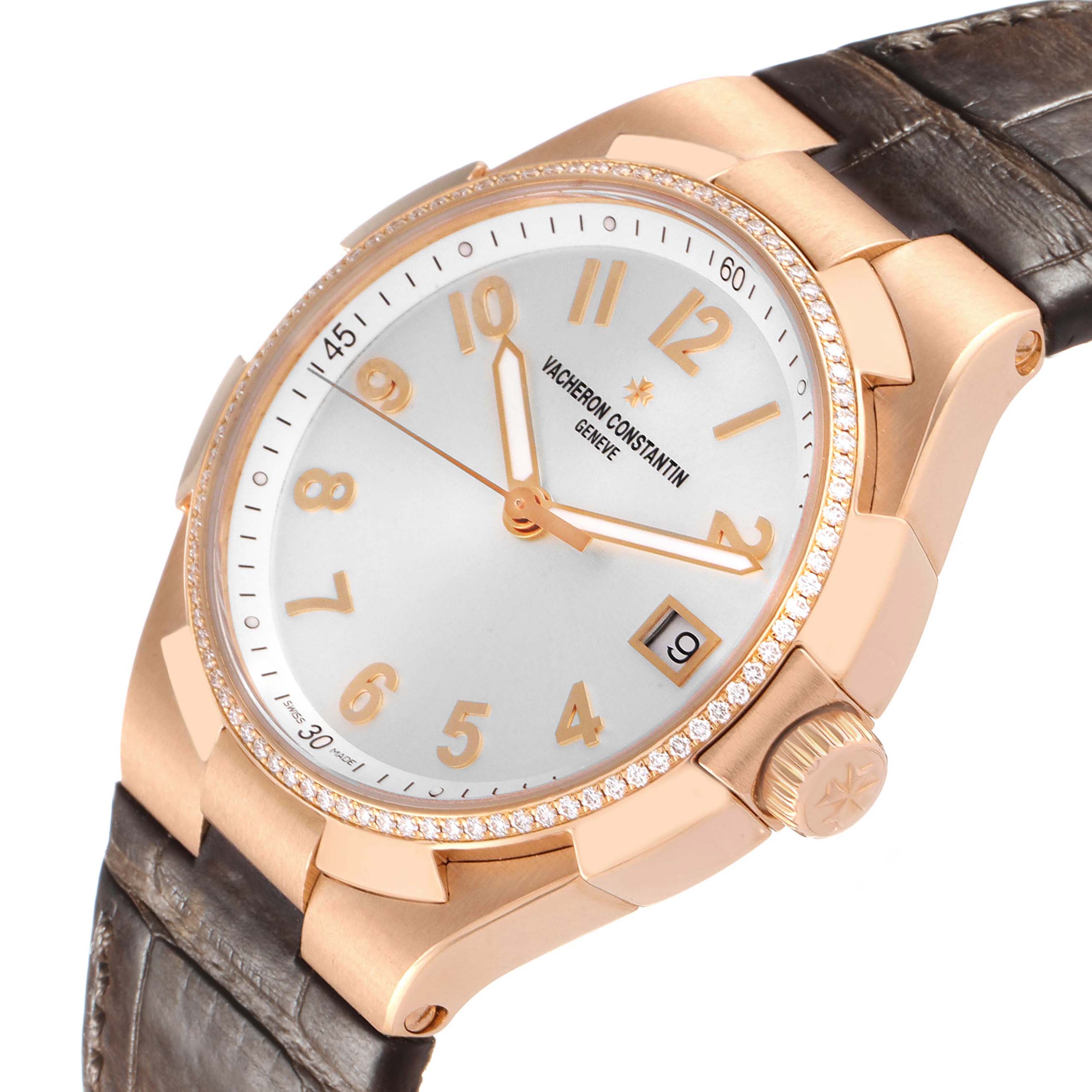 The Vacheron Constantin Overseas 47560/000R-9672 Women's Rose Gold Silver Dial watch is shown at an angled view, displaying the dial, bezel with diamonds, crown, and part of the strap.