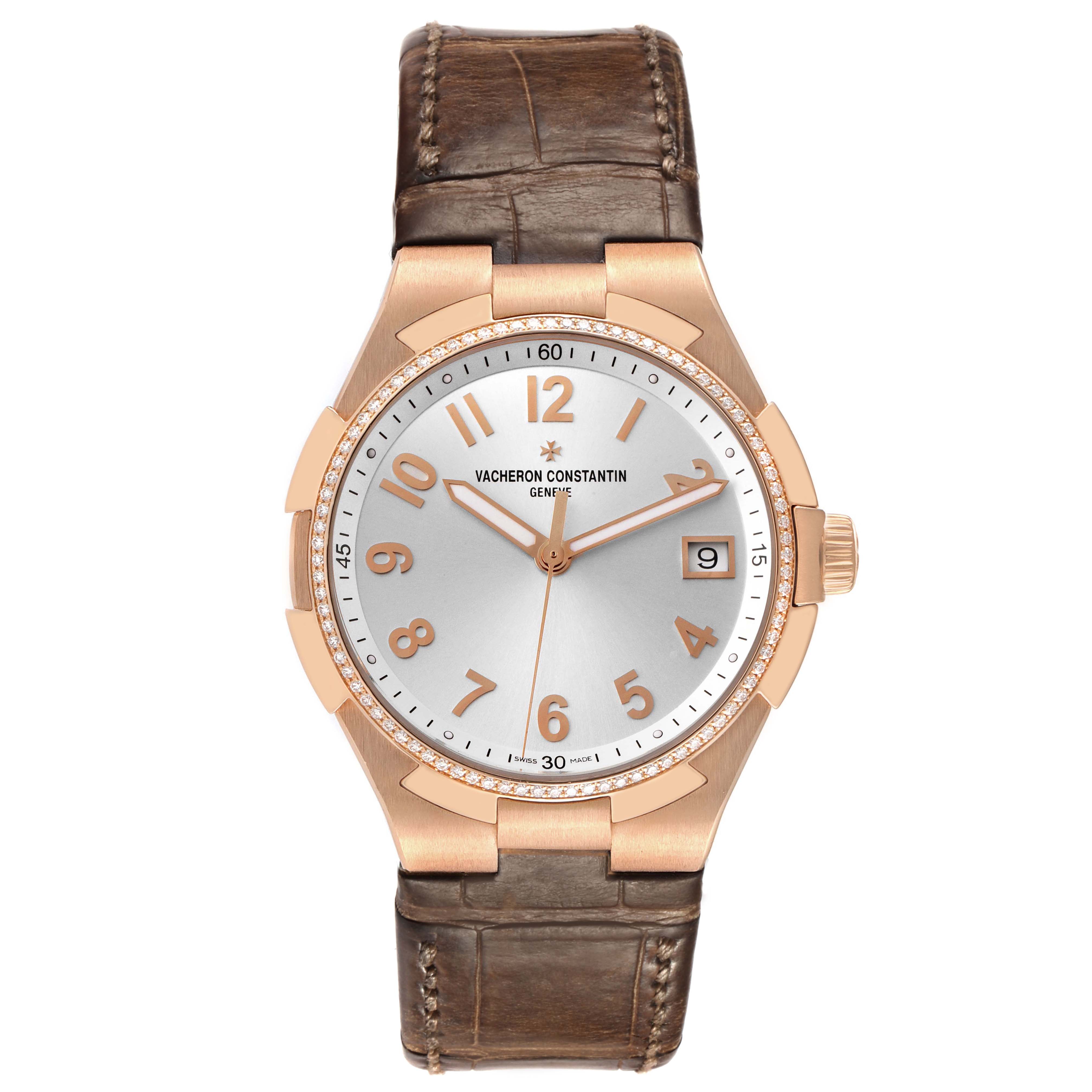 The Vacheron Constantin Overseas 47560/000R-9672 Women's Rose Gold Silver Dial watch is shown from a top-down angle, displaying the face, bezel, crown, and leather strap.