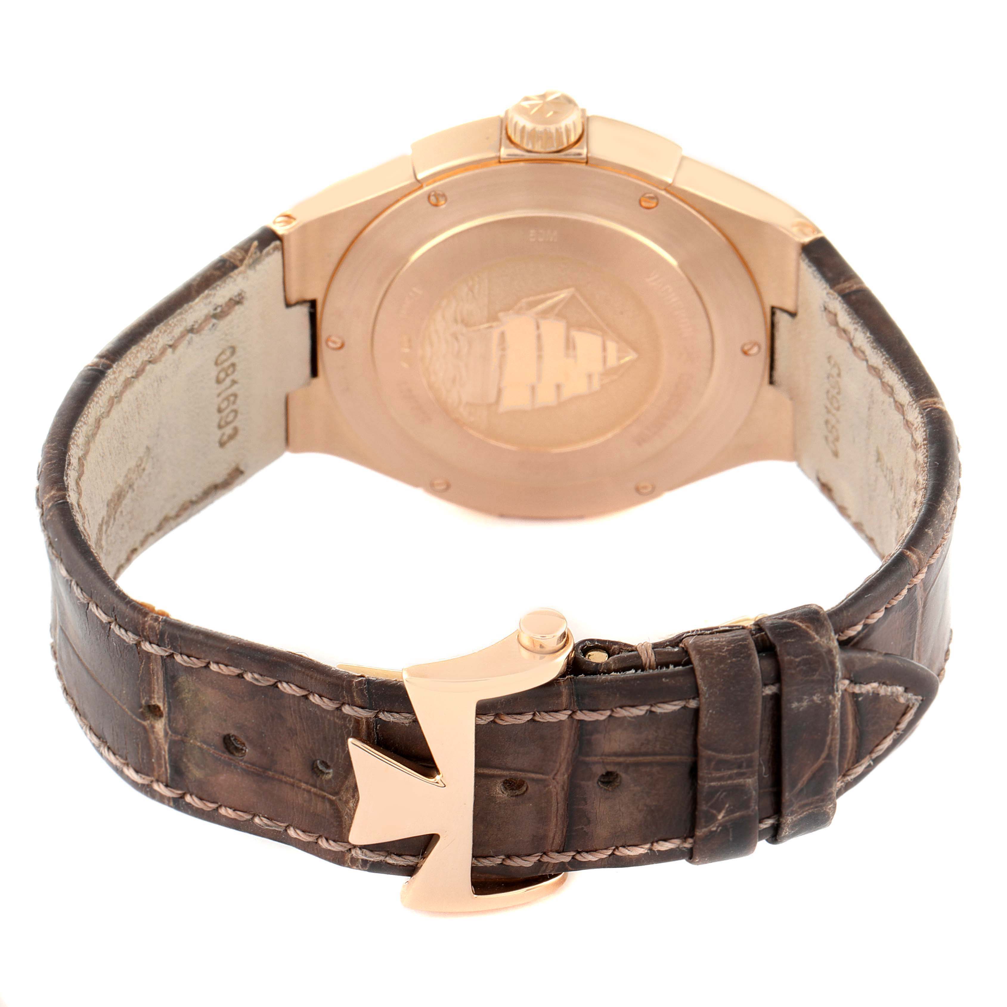 The image shows the back of a Vacheron Constantin Overseas 47560/000R-9672 Women's Rose Gold Silver Dial watch, highlighting the clasp and leather strap.