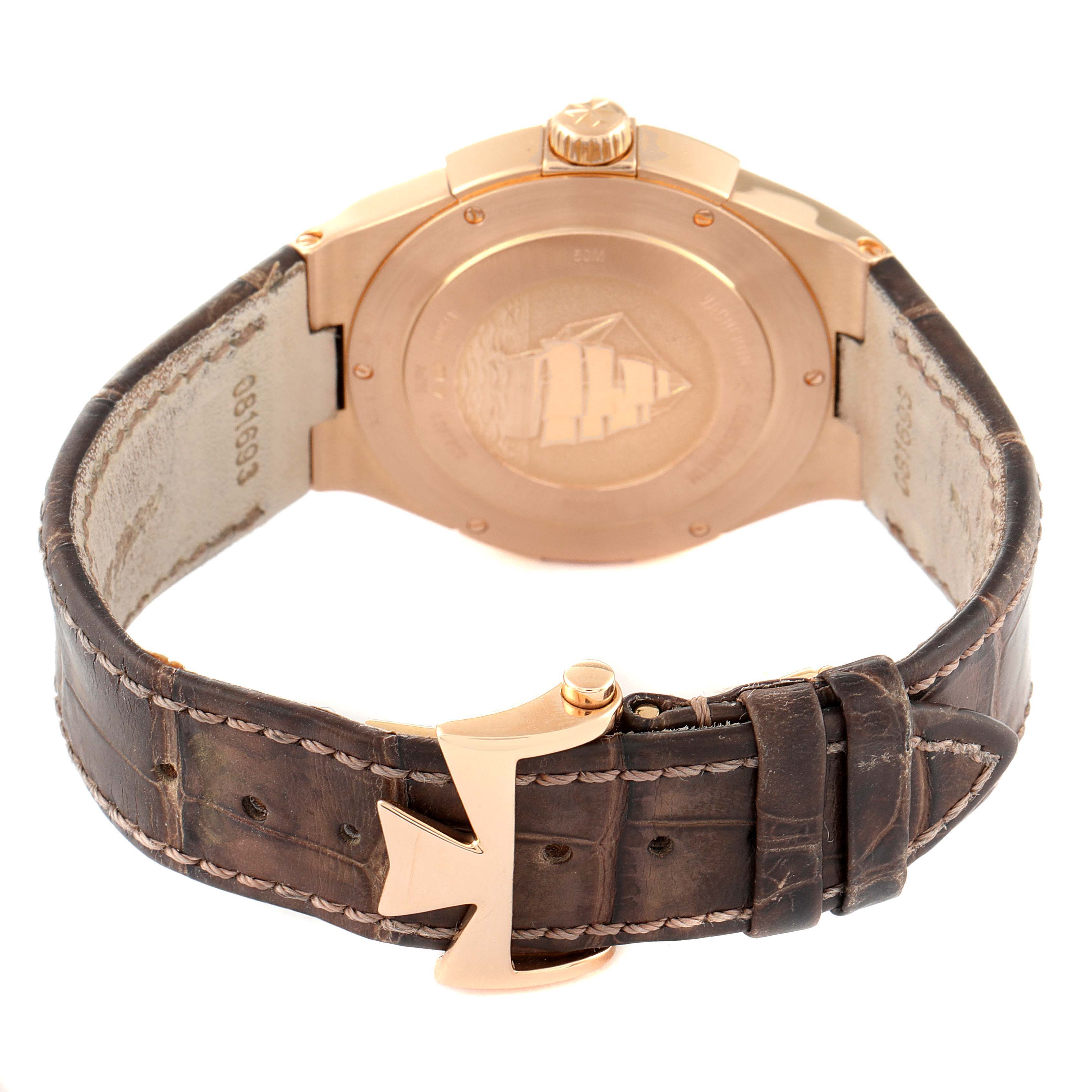 The image shows the back and clasp of the Vacheron Constantin Overseas 47560/000R-9672 Women's Rose Gold Silver Dial 47560/000R-9672 Women's Rose Gold Silver Dial watch, highlighting its brown leather strap and rose gold components.