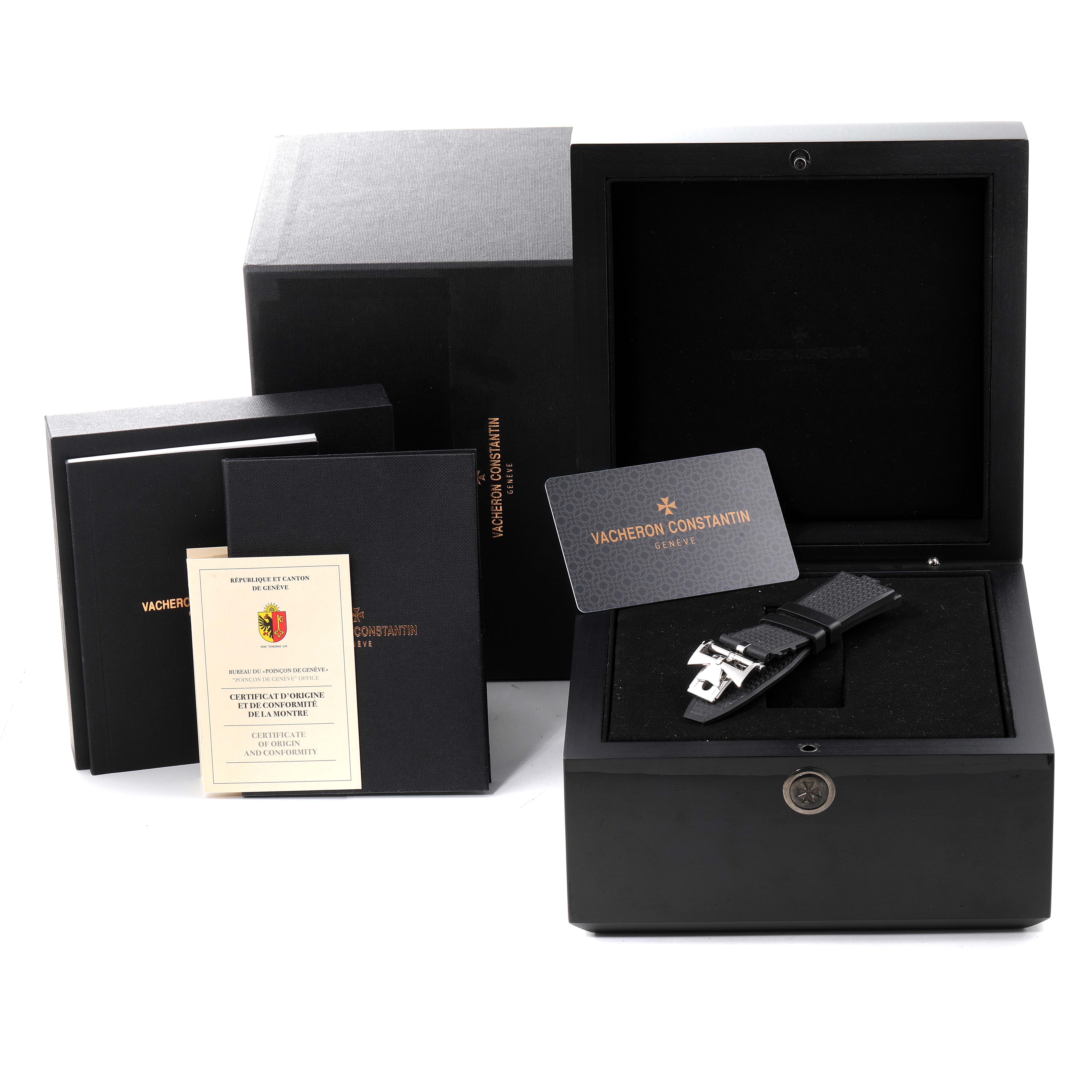 The image shows the Vacheron Constantin Overseas 4500V/110A-B126 Men's Stainless Steel Silver Dial 4500V/110A-B126 Men's Stainless Steel Silver Dial watch accessories, including a box, a strap, documentation, and a warranty card.