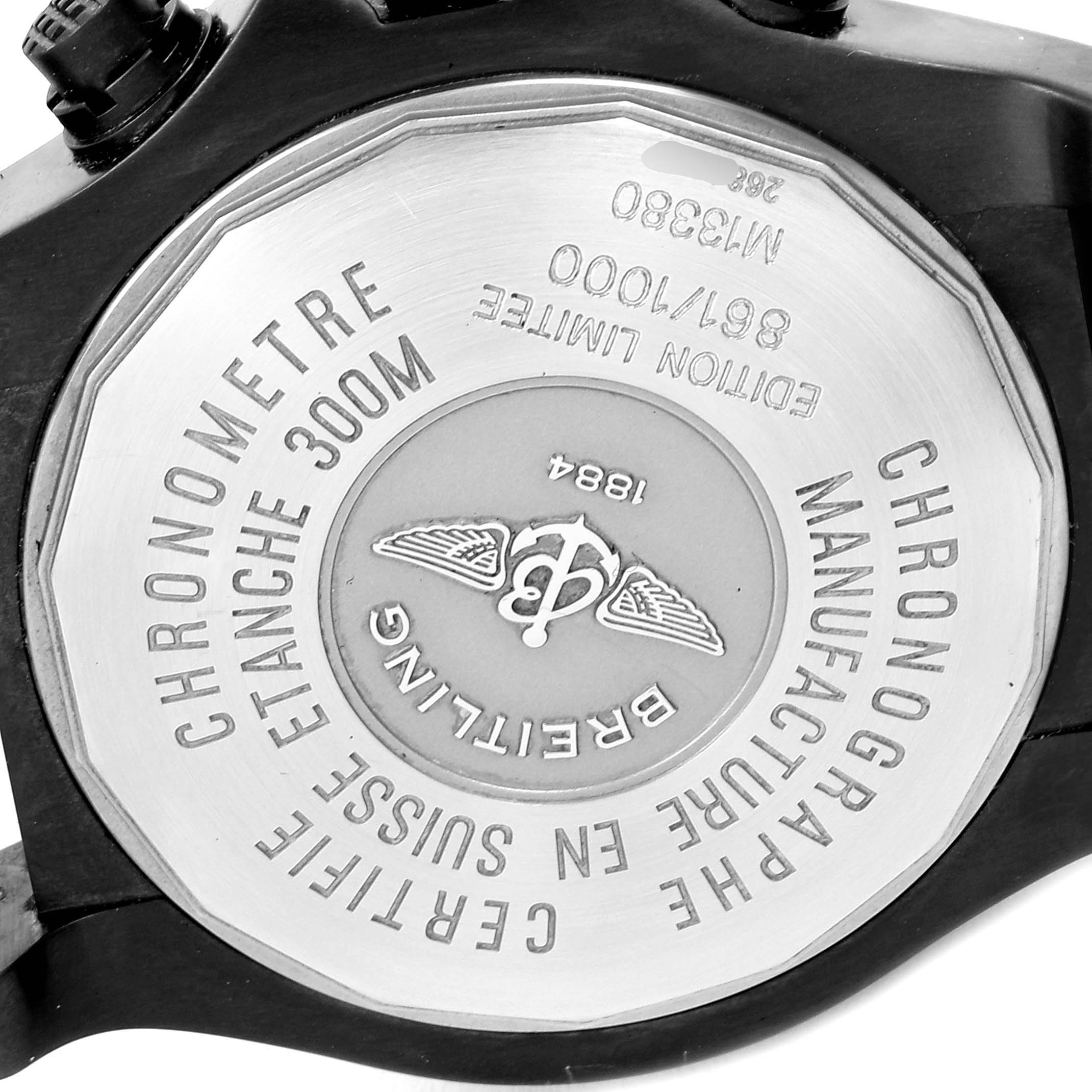 The image shows the back case of a Breitling Avenger M13380 Men
s Stainless Steel Black Dial M13380 Men
s Stainless Steel Black Dial watch, displaying the brand name, logo, model specifications, and limited edition number.