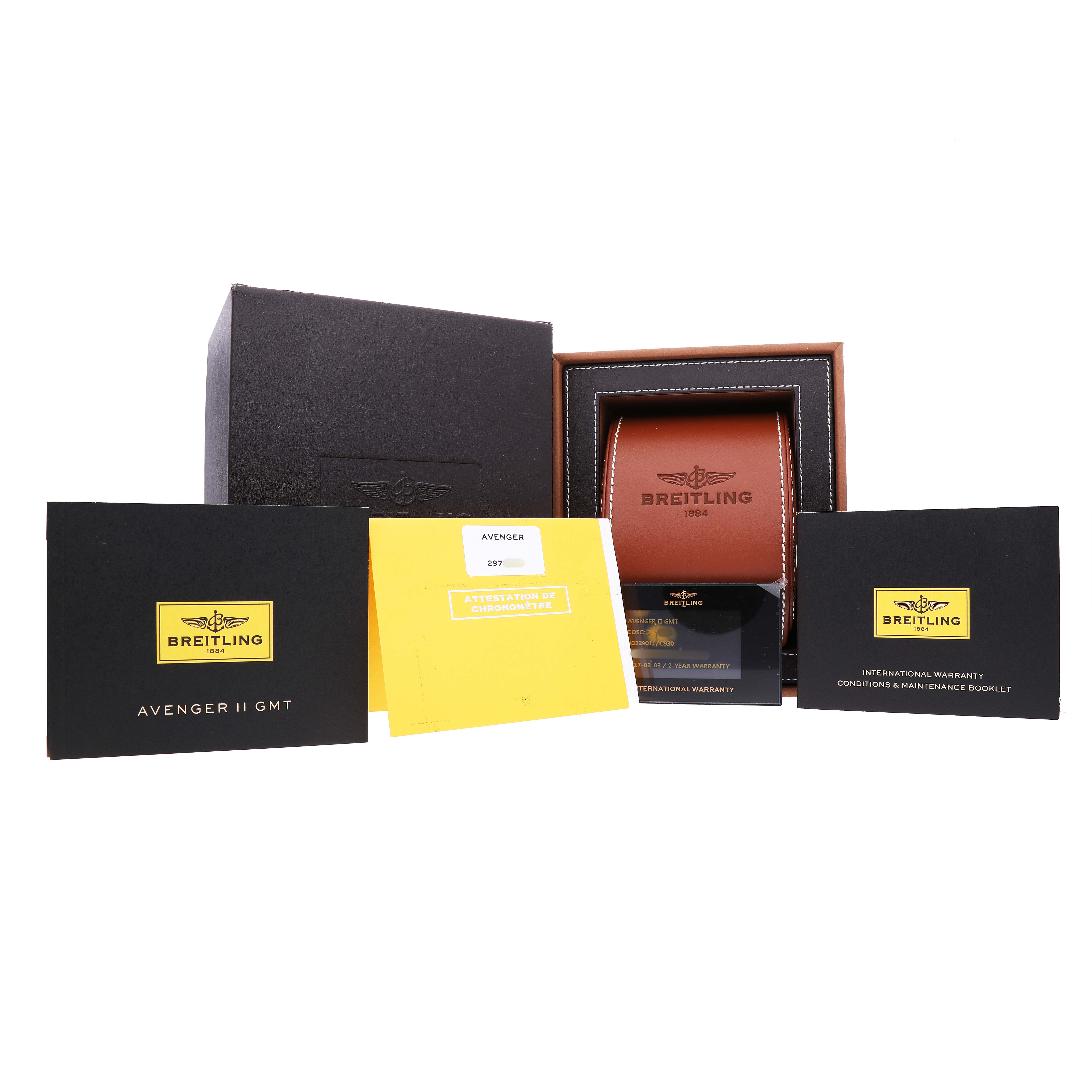 The image shows the Breitling Avenger A3239011/C930 Men's Stainless Steel Blue Dial watch box, warranty cards, and booklets from a straight angle.