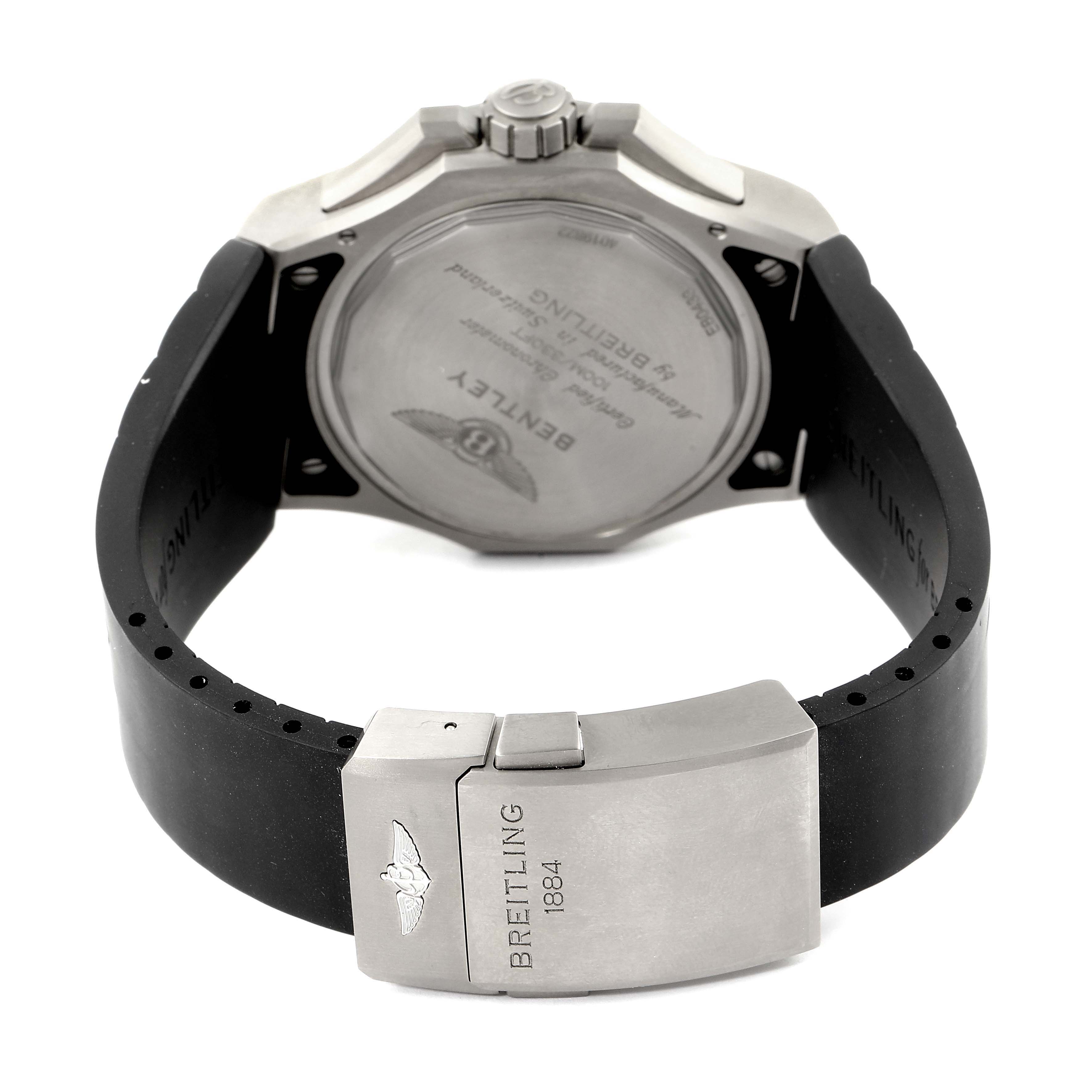 The image shows the rear view of a Breitling Bentley EB0433 Men's Titanium Black Dial EB0433 Men's Titanium Black Dial watch focusing on the case back and clasp of the rubber strap.