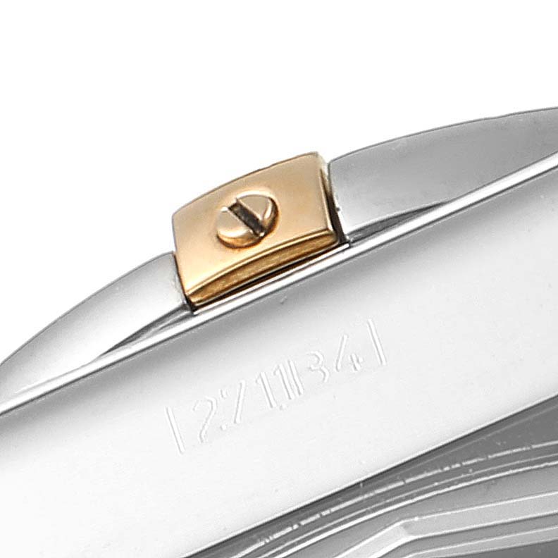 This close-up shows a part of the case and a gold screw detail from a Breitling Chronomat IB0110 Men
s Stainless Steel Silver Dial IB0110 Men
s Stainless Steel Silver Dial watch.