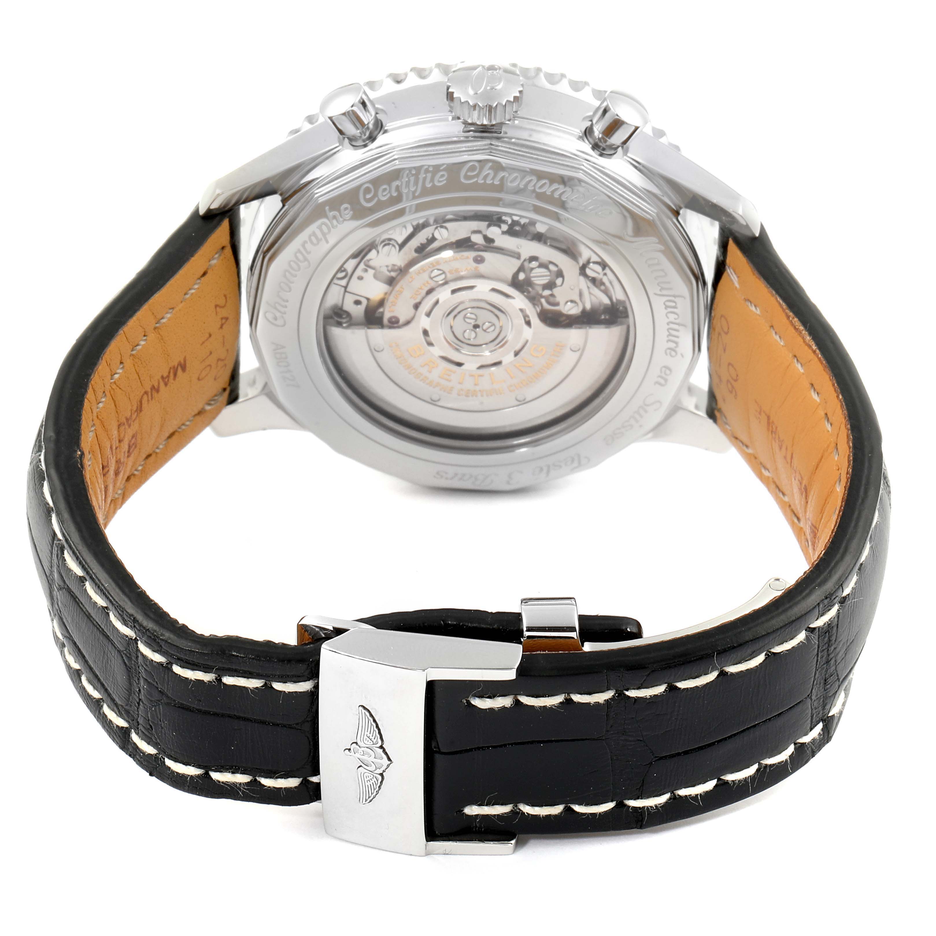 This image shows the back view of a Breitling Navitimer AB0127211C1A1 Men
s Stainless Steel Black Dial AB0127211C1A1 Men
s Stainless Steel Black Dial watch, highlighting the movement through the transparent case back and the leather strap with buckle.