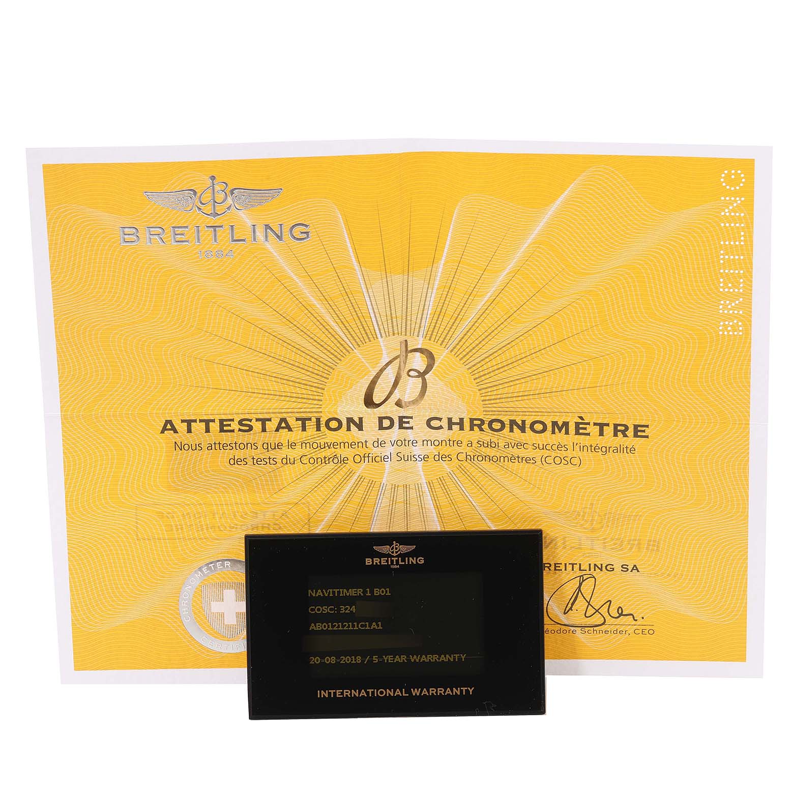 The image shows the warranty card and chronometer certificate for a Breitling Navitimer AB0121 Men
s Stainless Steel Blue Dial AB0121 Men
s Stainless Steel Blue Dial model.