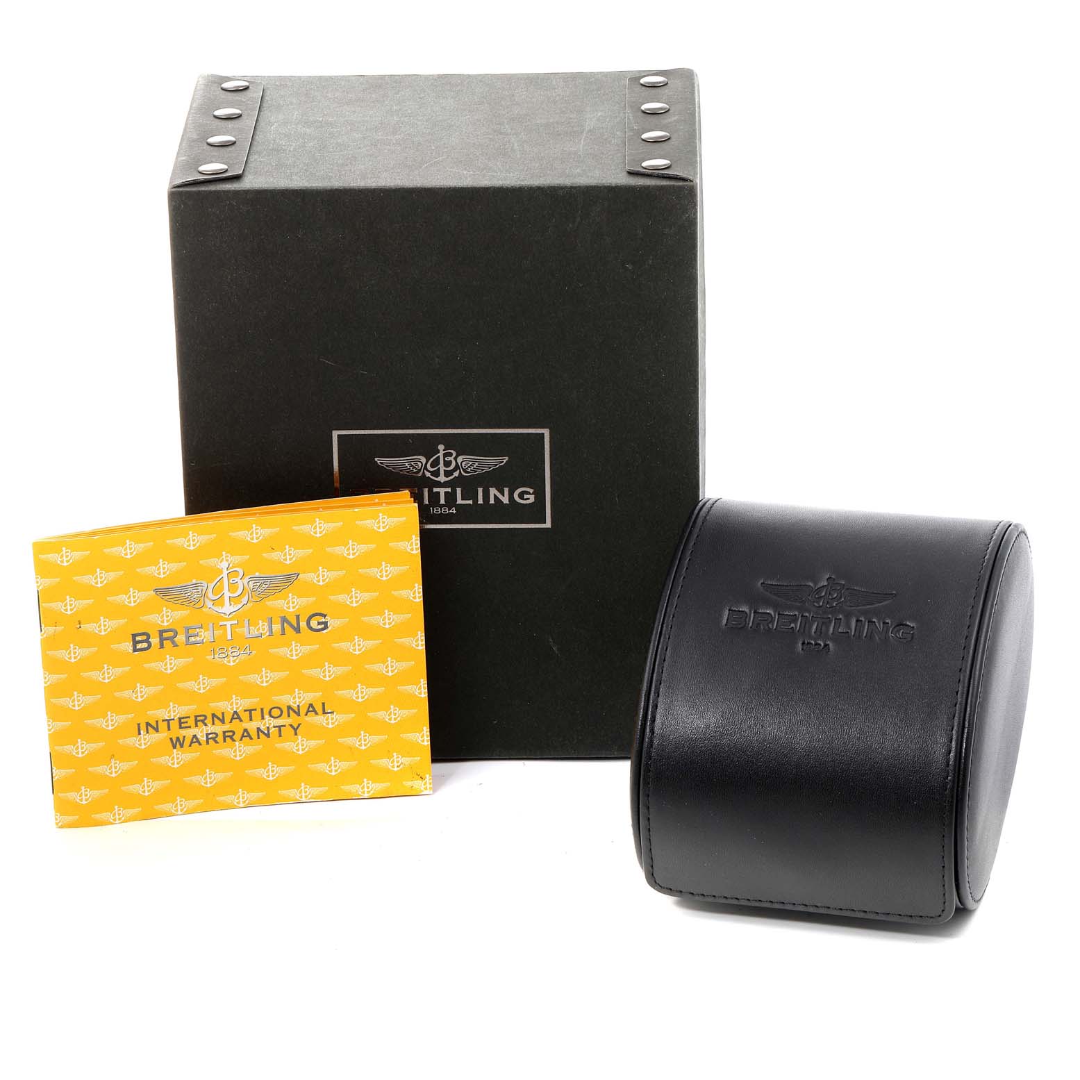 The image shows the packaging, international warranty card, and watch case for a Breitling Navitimer A41322 Men's Stainless Steel Silver Dial A41322 Men's Stainless Steel Silver Dial model.