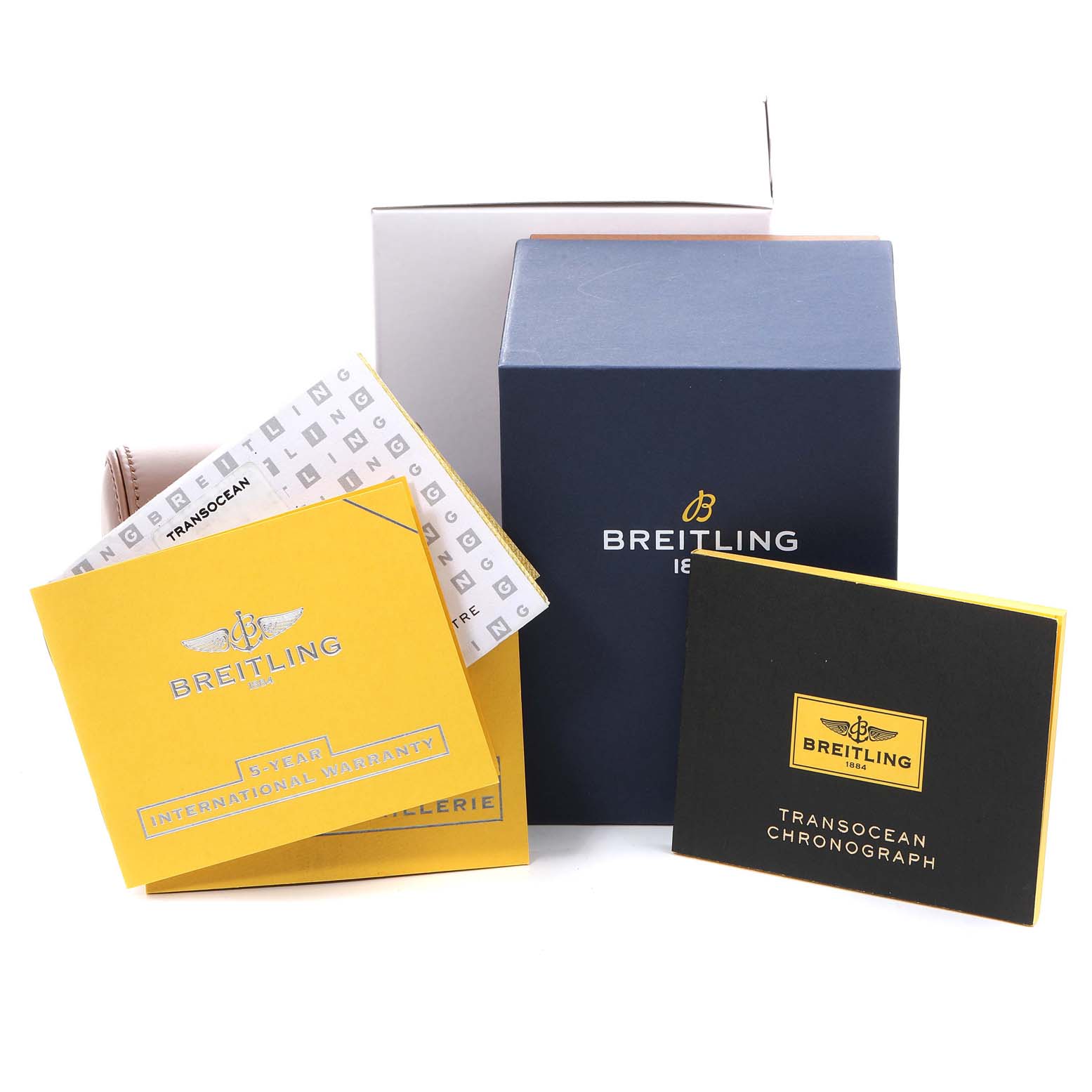 This image shows the packaging and documentation for the Breitling Transocean RB0152 Men's Rose Gold Brown Dial RB0152 Men's Rose Gold Brown Dial watch model, including warranty and chronograph booklets.