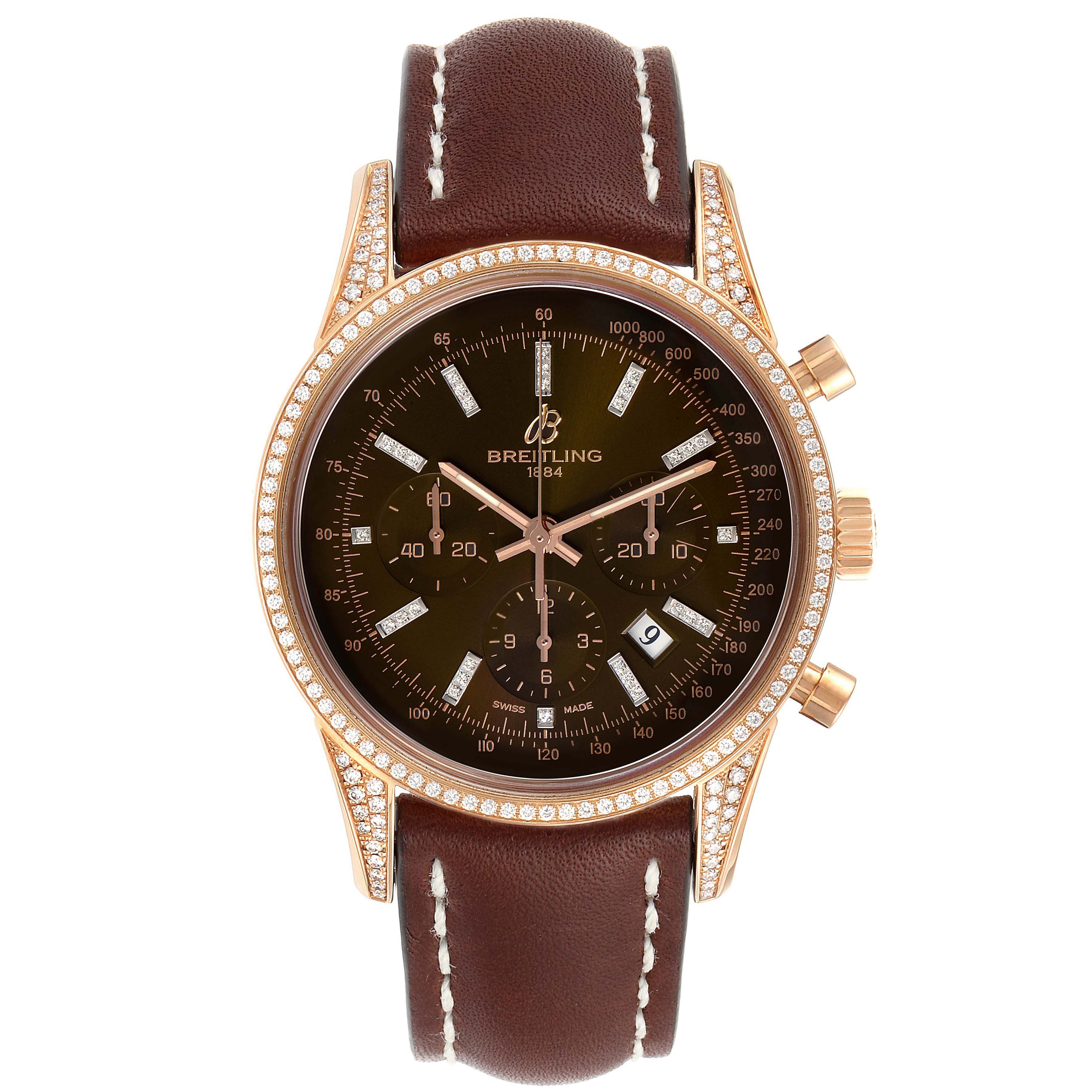 The image shows a frontal view of a Breitling Transocean RB0152 Men's Rose Gold Brown Dial RB0152 Men's Rose Gold Brown Dial watch with a brown leather strap and diamond-encrusted bezel.