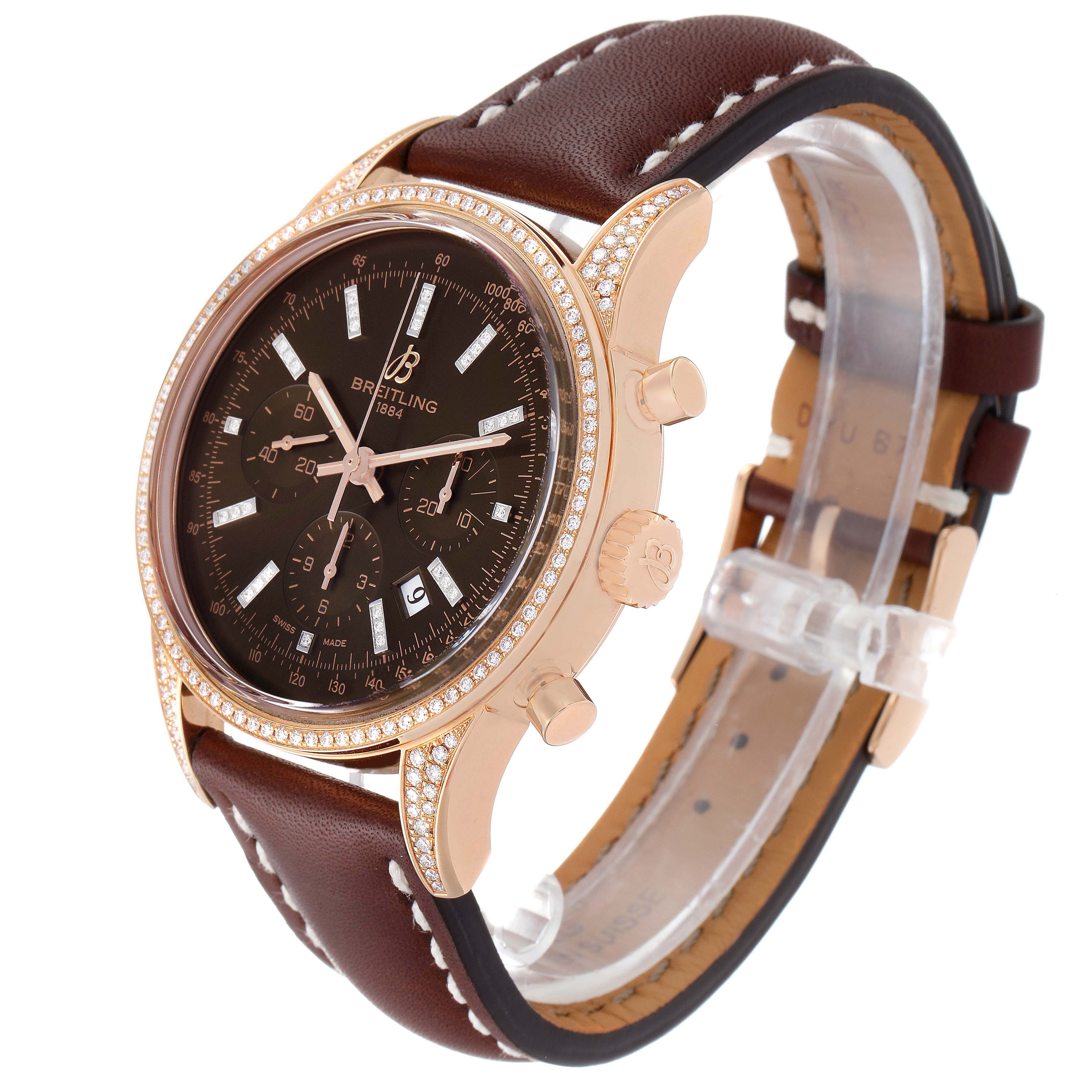 The Breitling Transocean RB0152 Men's Rose Gold Brown Dial RB0152 Men's Rose Gold Brown Dial watch is shown from an angled front view, highlighting its face, side push-buttons, and leather strap.