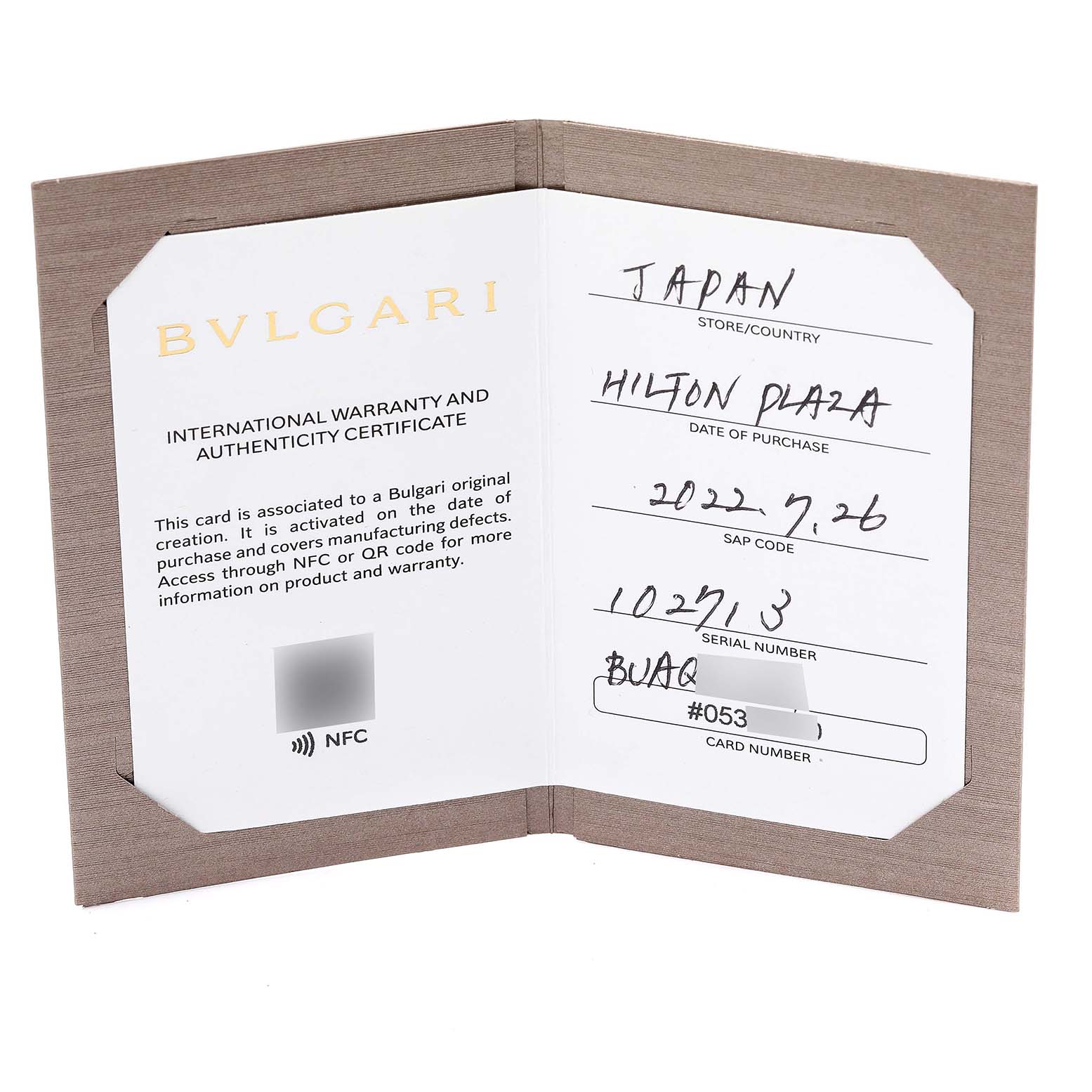 The image shows the international warranty and authenticity certificate for a Bvlgari Octo 102713 Men's Titanium Grey Dial 102713 Men's Titanium Grey Dial model watch.