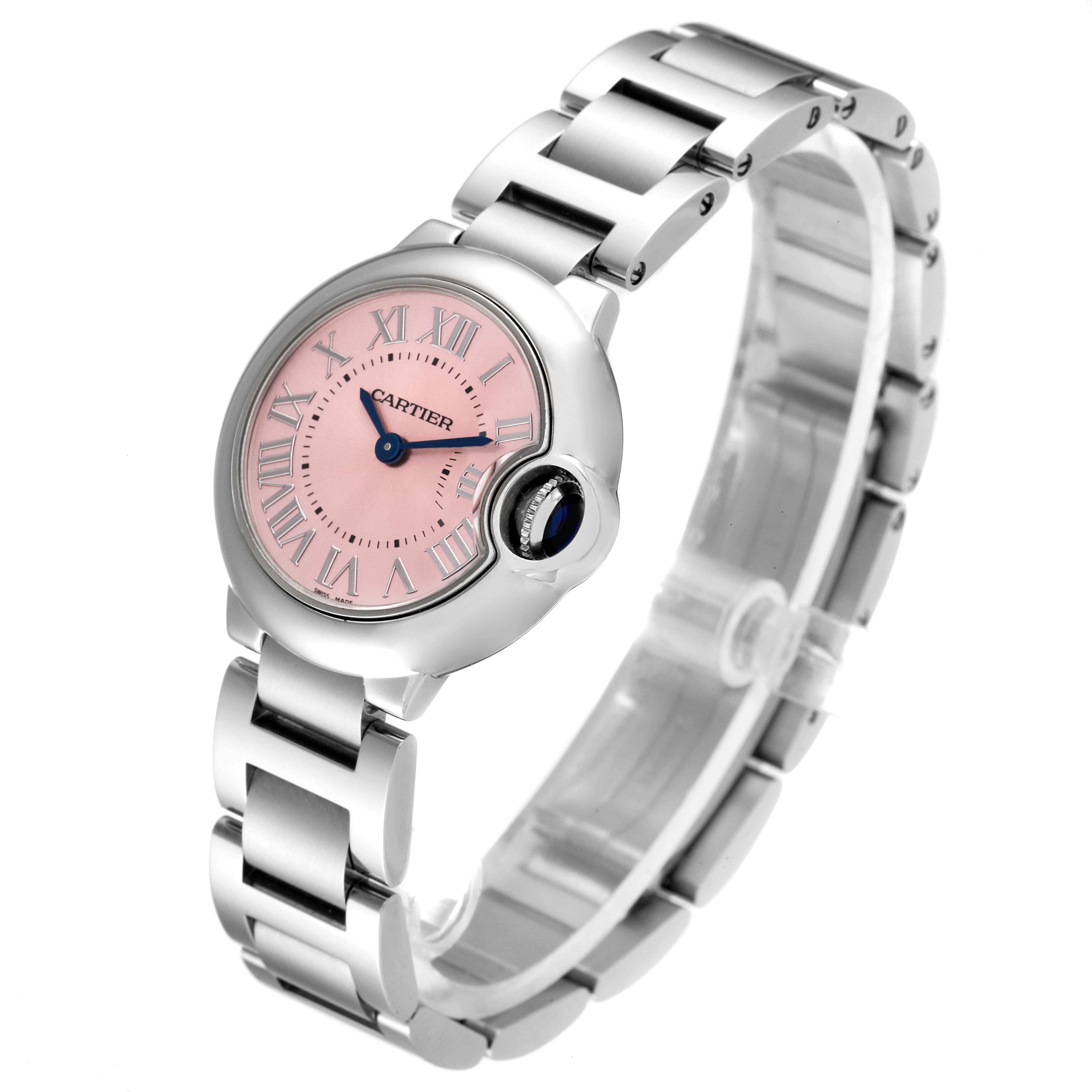The Cartier Ballon Bleu W6920038 Women
s Stainless Steel Pink Dial W6920038 Women
s Stainless Steel Pink Dial watch is shown from an angled side view, highlighting its bracelet, dial, and crown.