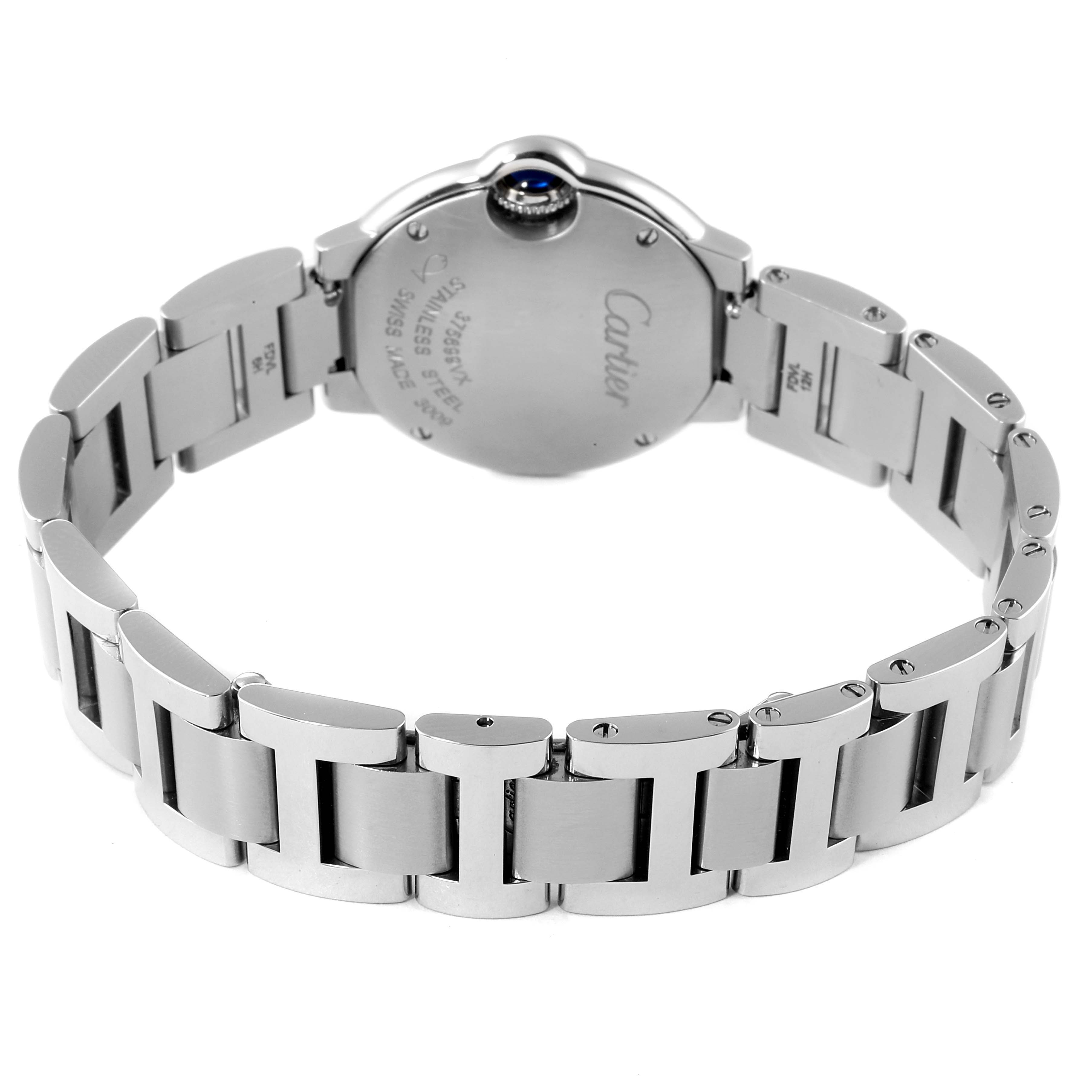 The image shows the back view of a Ballon Bleu model by Cartier, highlighting the watch
s case and metal bracelet.