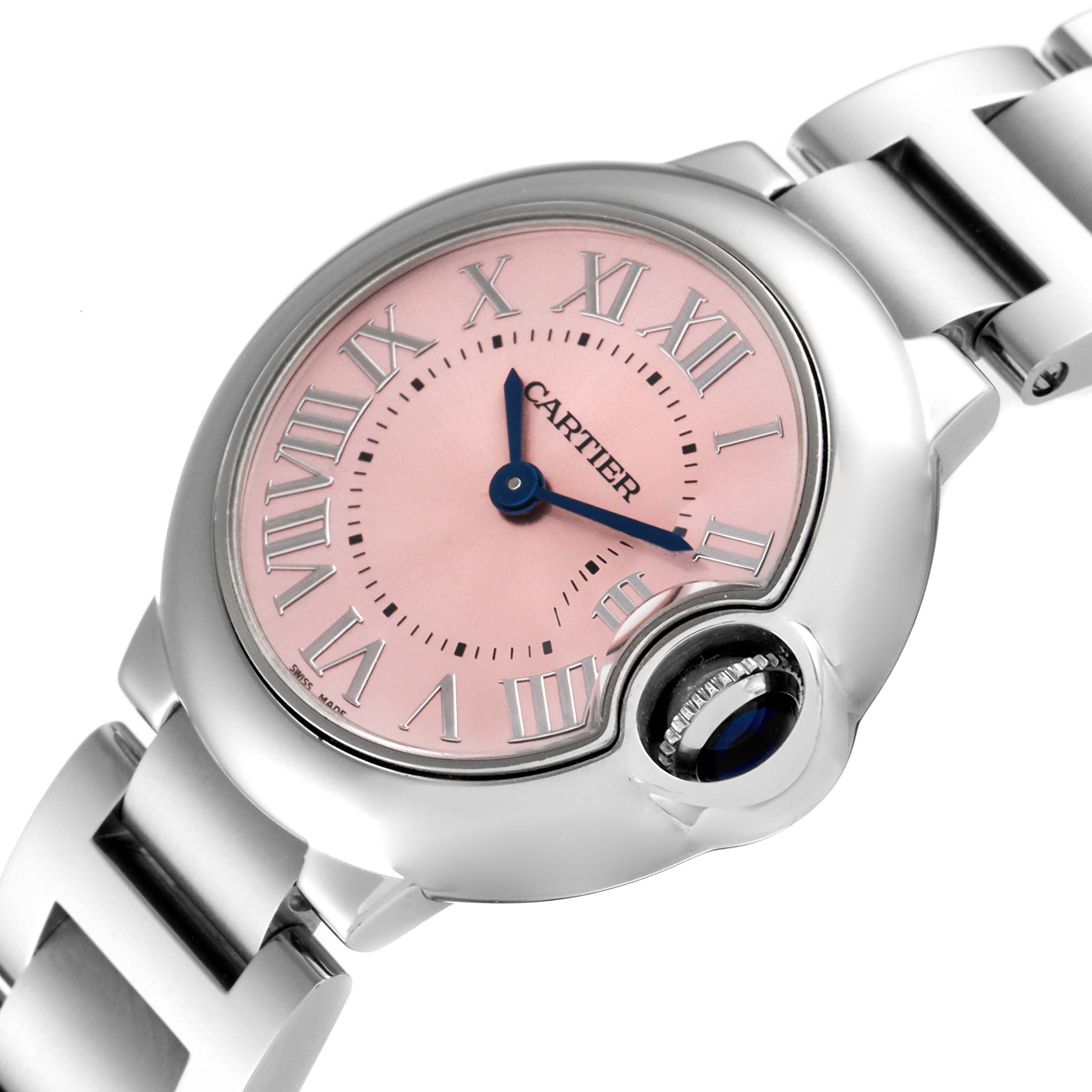 The image shows a Cartier Ballon Bleu W6920038 Women
s Stainless Steel Pink Dial W6920038 Women
s Stainless Steel Pink Dial watch at an angle highlighting its pink dial, blue hands, and part of the stainless steel bracelet.