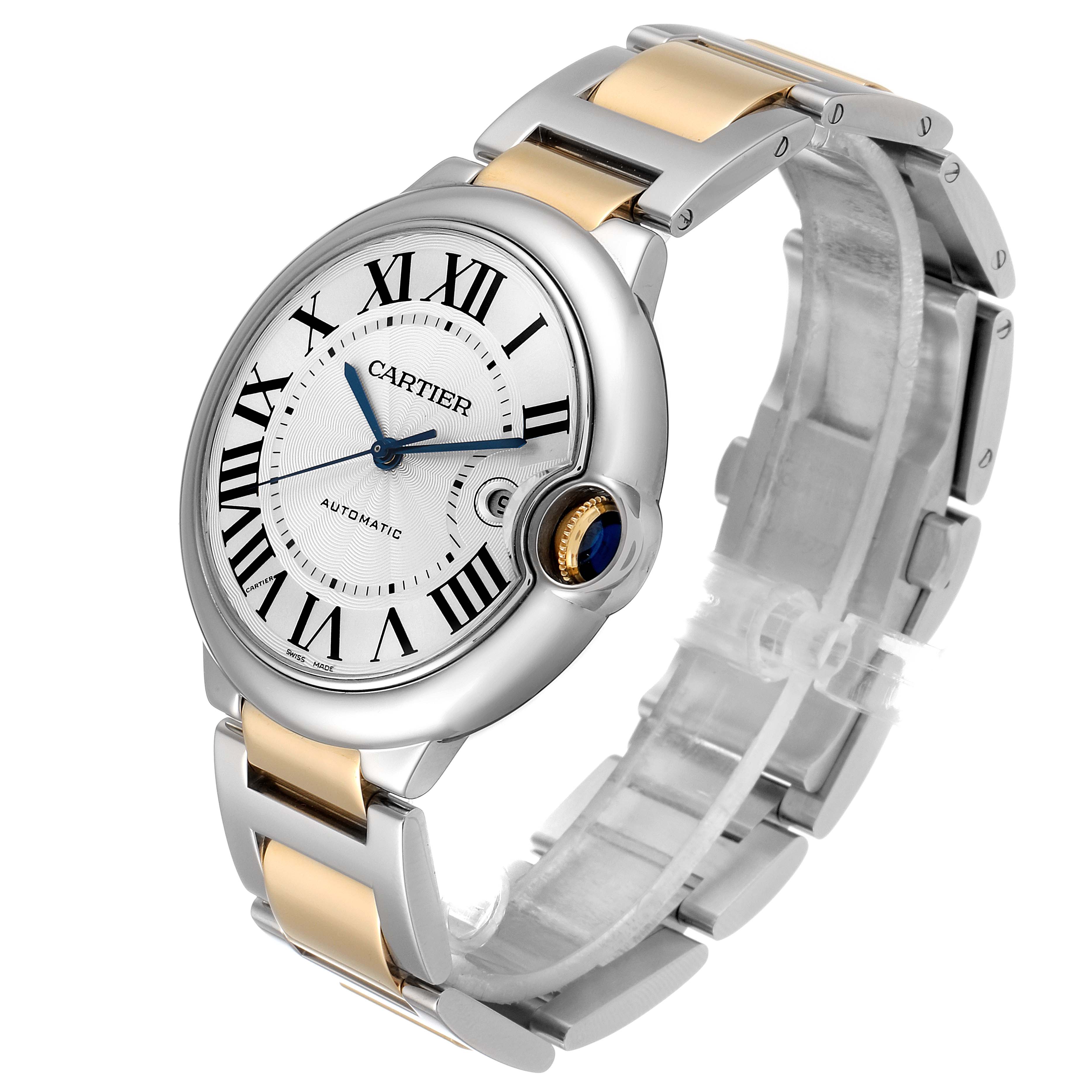 This image shows a Ballon Bleu watch by Cartier from an angled side view, highlighting its face, dial, and two-tone metal bracelet.
