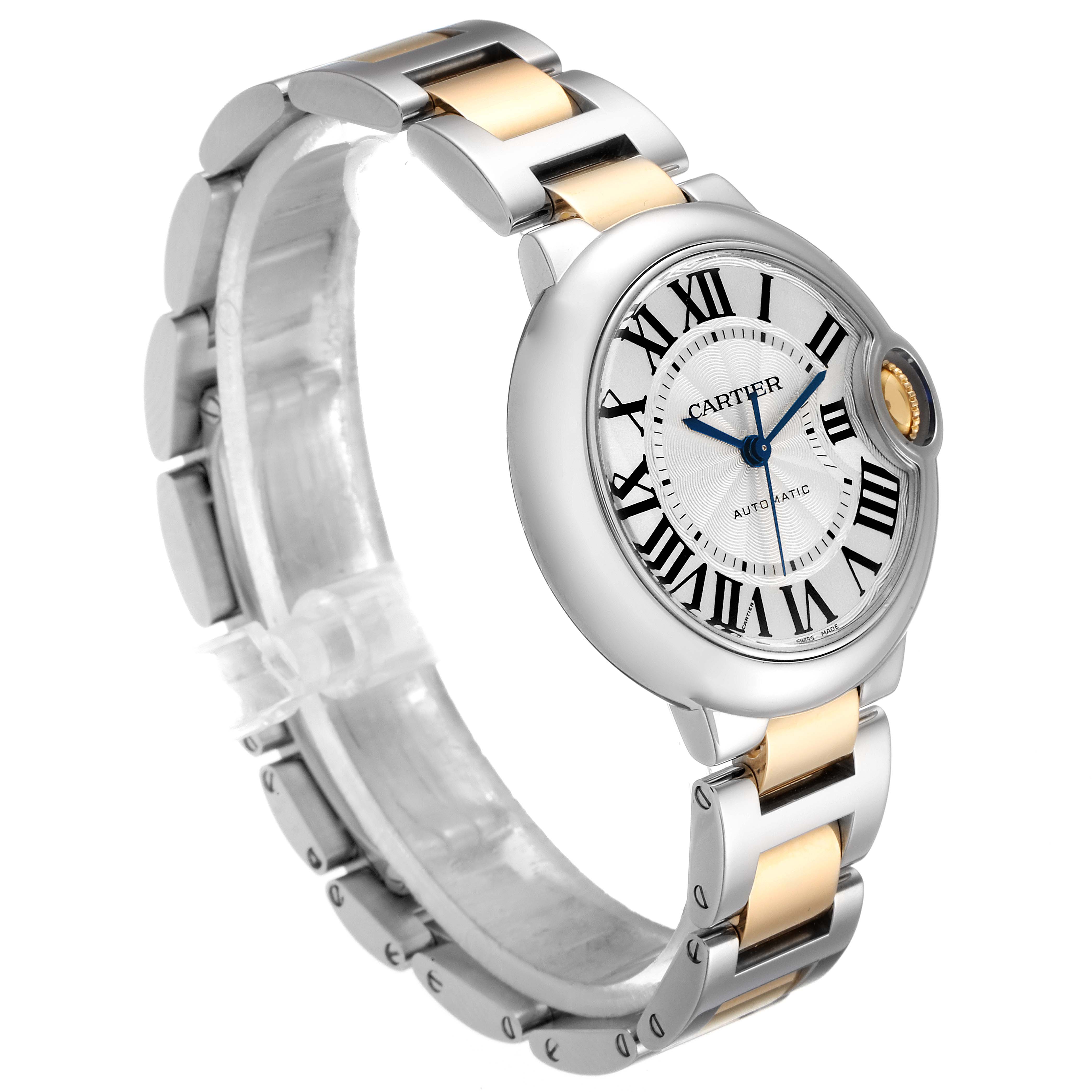 This image shows a side angle of the Cartier Ballon Bleu W2BB0002 Women
s Steel and Gold (two tone) Silver Dial W2BB0002 Women
s Steel and Gold (two tone) Silver Dial watch, highlighting the dial, bracelet, and crown.