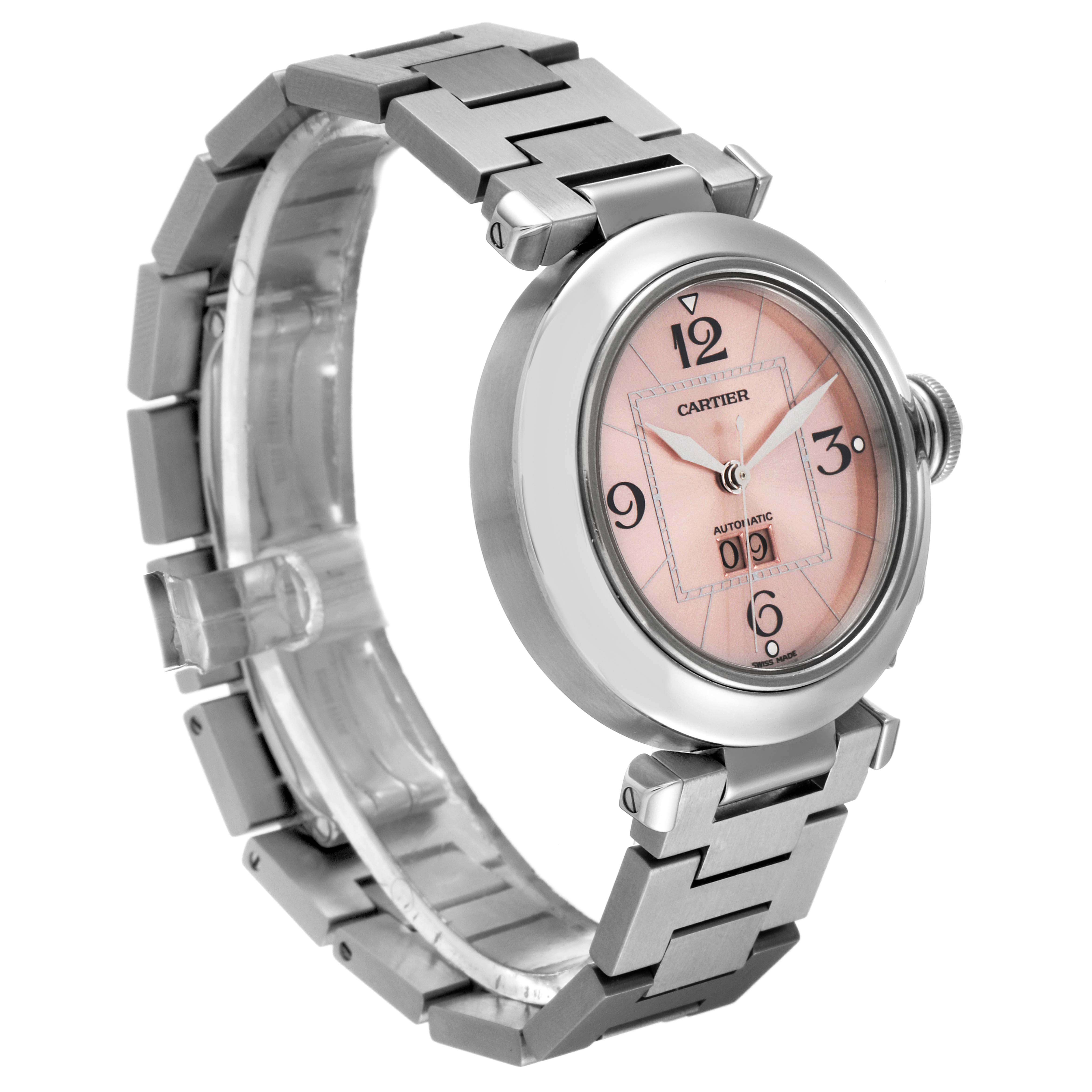 The Cartier Pasha W31058M7 Women's Stainless Steel Pink Dial W31058M7 Women's Stainless Steel Pink Dial watch is shown from an angled perspective, showcasing its face, bezel, and metal bracelet.