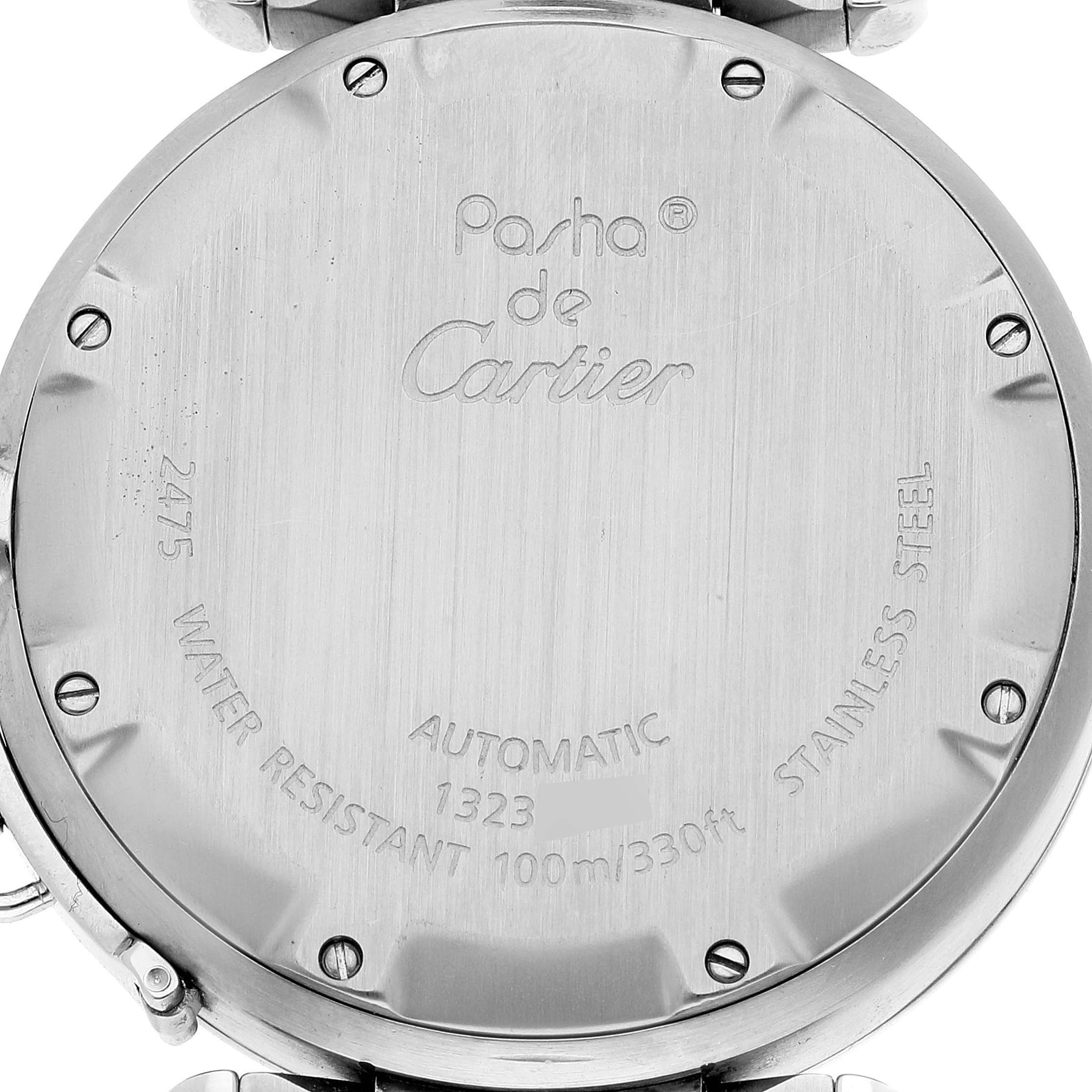 The image shows the back case of a Cartier Pasha W31058M7 Women's Stainless Steel Pink Dial W31058M7 Women's Stainless Steel Pink Dial watch, displaying engravings and screws.