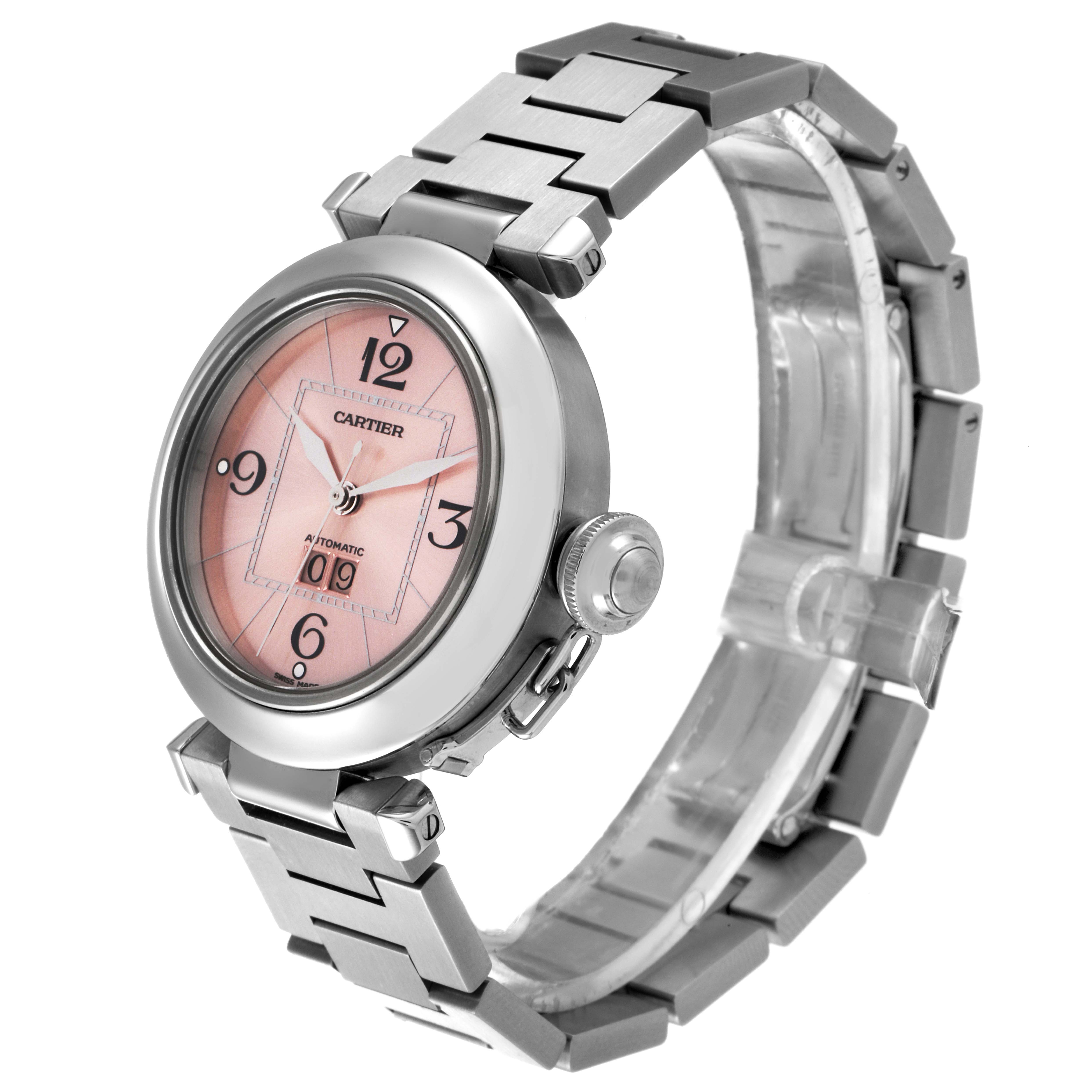The image shows a Cartier Pasha W31058M7 Women's Stainless Steel Pink Dial W31058M7 Women's Stainless Steel Pink Dial watch at a three-quarter angle, highlighting the face, bezel, crown, and bracelet.