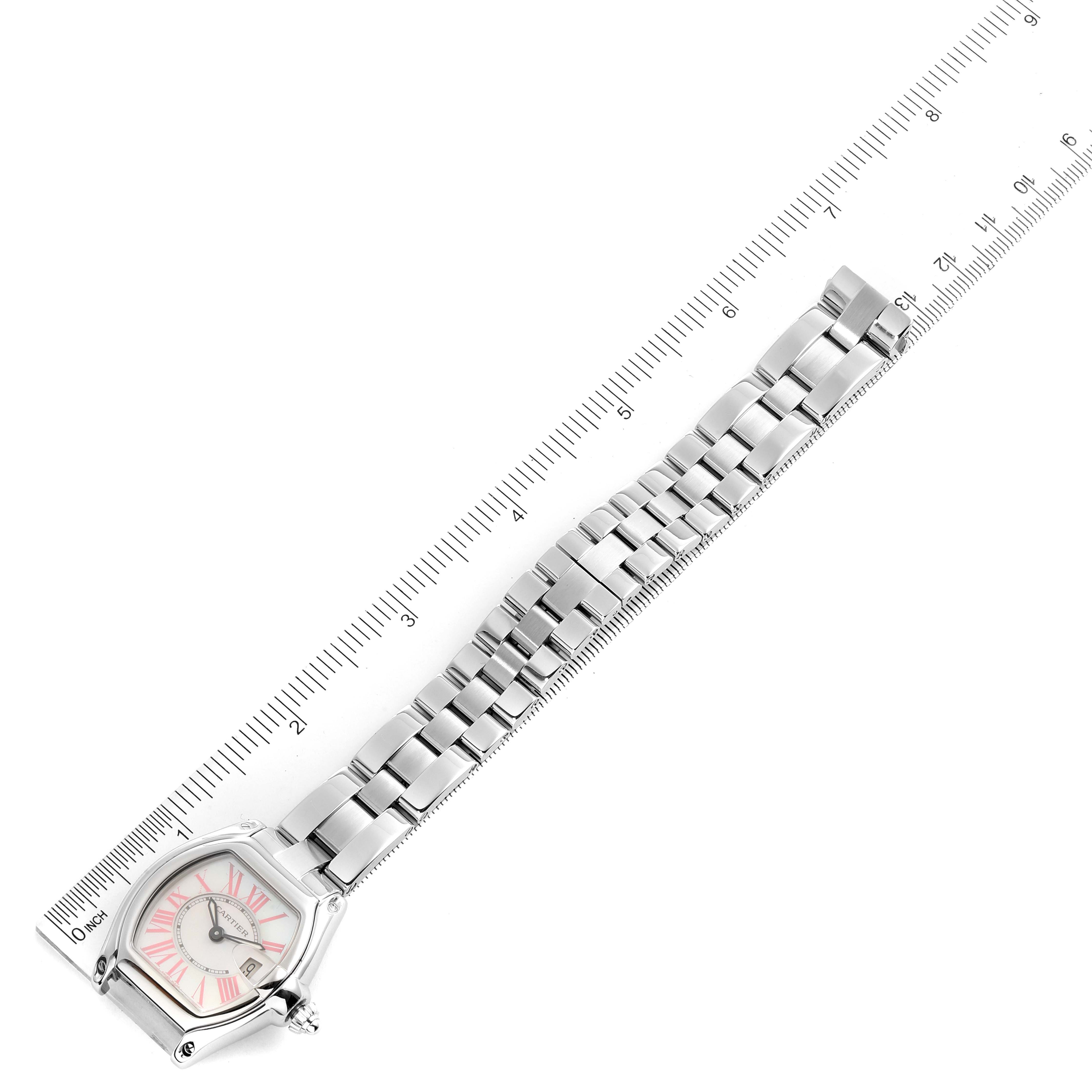 The Cartier Roadster W6206006 Women's Stainless Steel Mother of Pearl Dial W6206006 Women's Stainless Steel Mother of Pearl Dial watch is displayed flat with the face and full metal bracelet visible, alongside a ruler for scale.