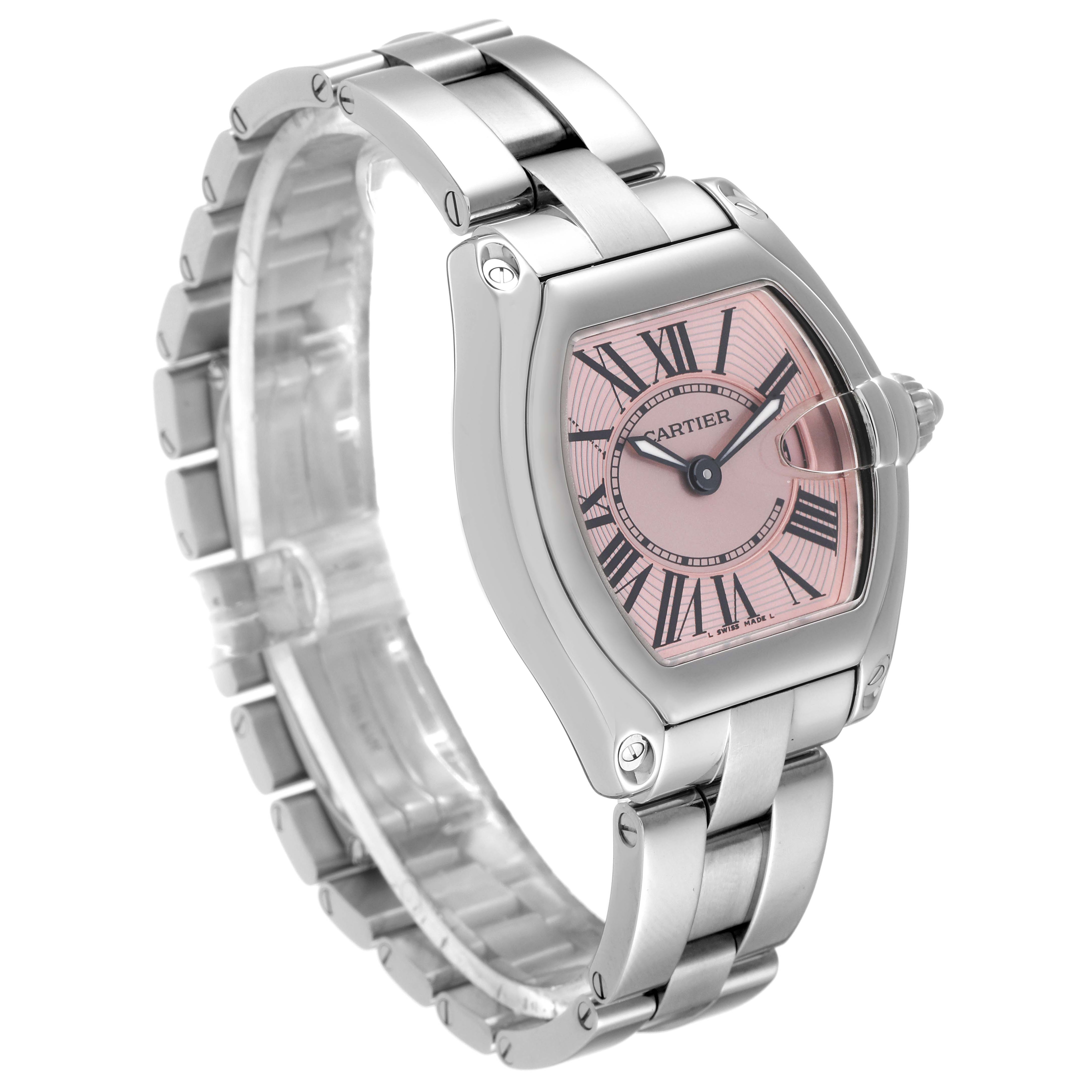 The Cartier Roadster W62017V3 Women's Stainless Steel Pink Dial W62017V3 Women's Stainless Steel Pink Dial watch is shown at a slight angle displaying its pink dial, Roman numerals, and stainless steel bracelet.