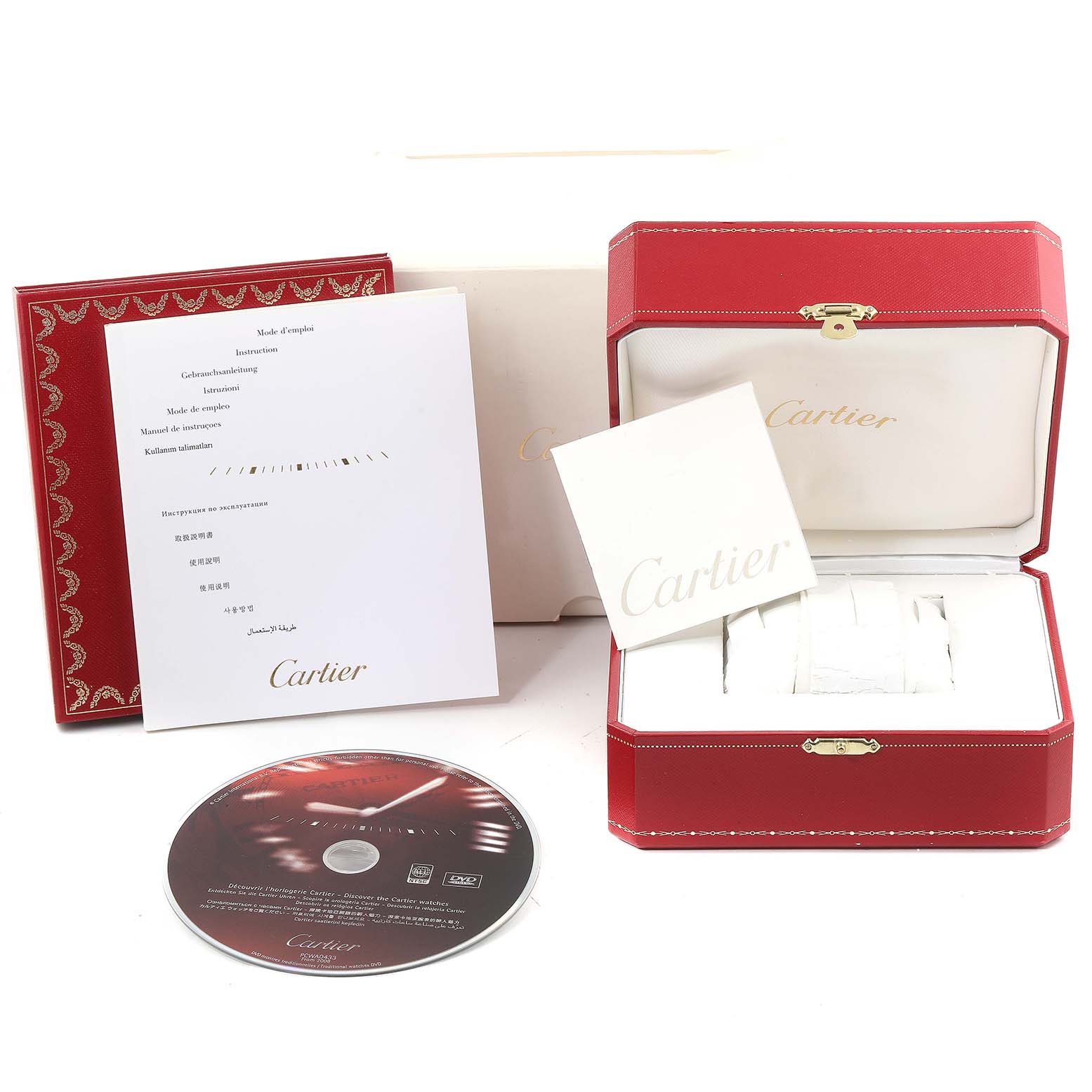 The image shows the packaging, manuals, and a DVD for the Cartier Tank Francaise W51027Q4 Women
s Stainless Steel Mother of Pearl Dial W51027Q4 Women
s Stainless Steel Mother of Pearl Dial watch.