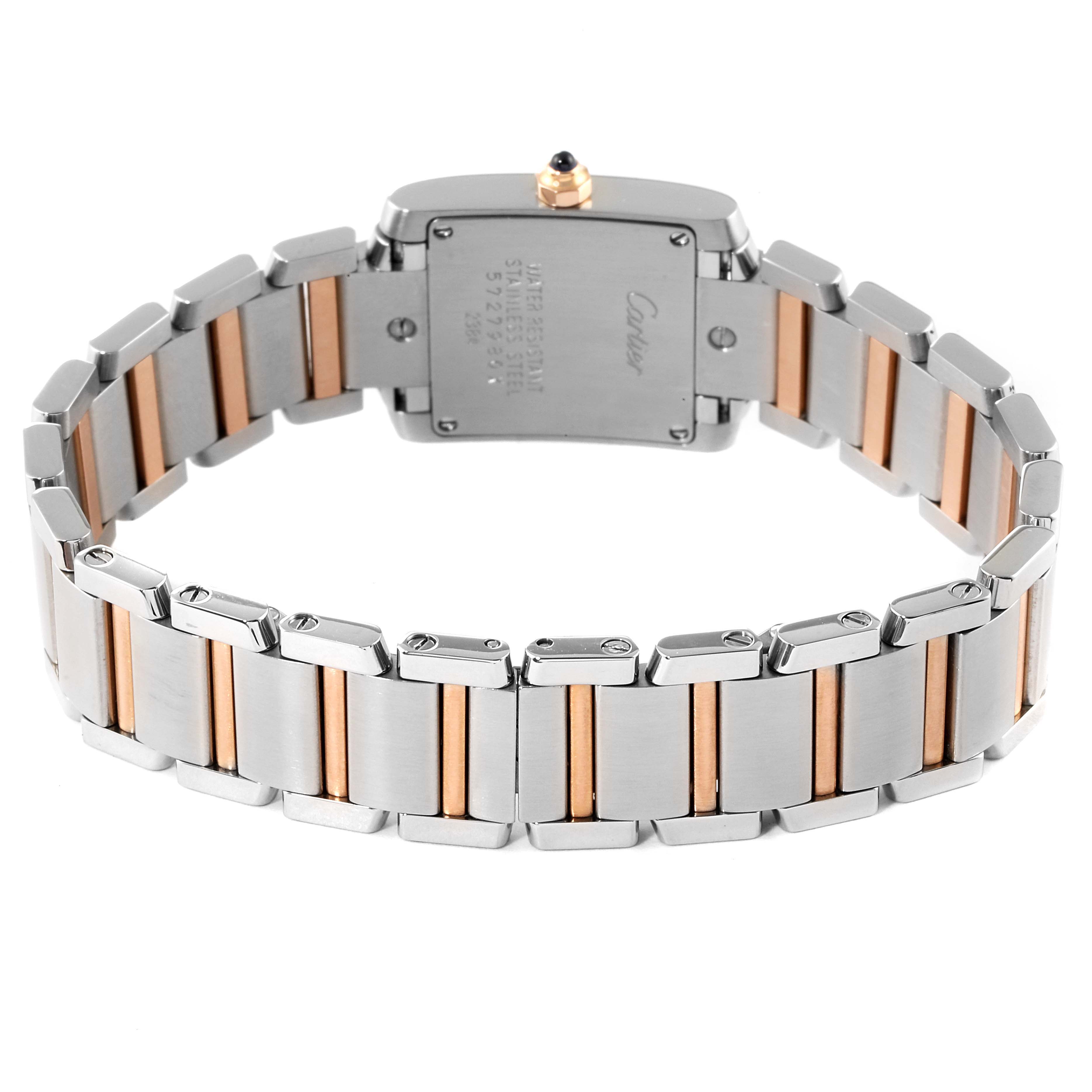 The image shows the back and bracelet of a Cartier Tank Francaise W51027Q4 Women
s Stainless Steel Mother of Pearl Dial W51027Q4 Women
s Stainless Steel Mother of Pearl Dial watch, featuring a mix of stainless steel and gold-tone links.